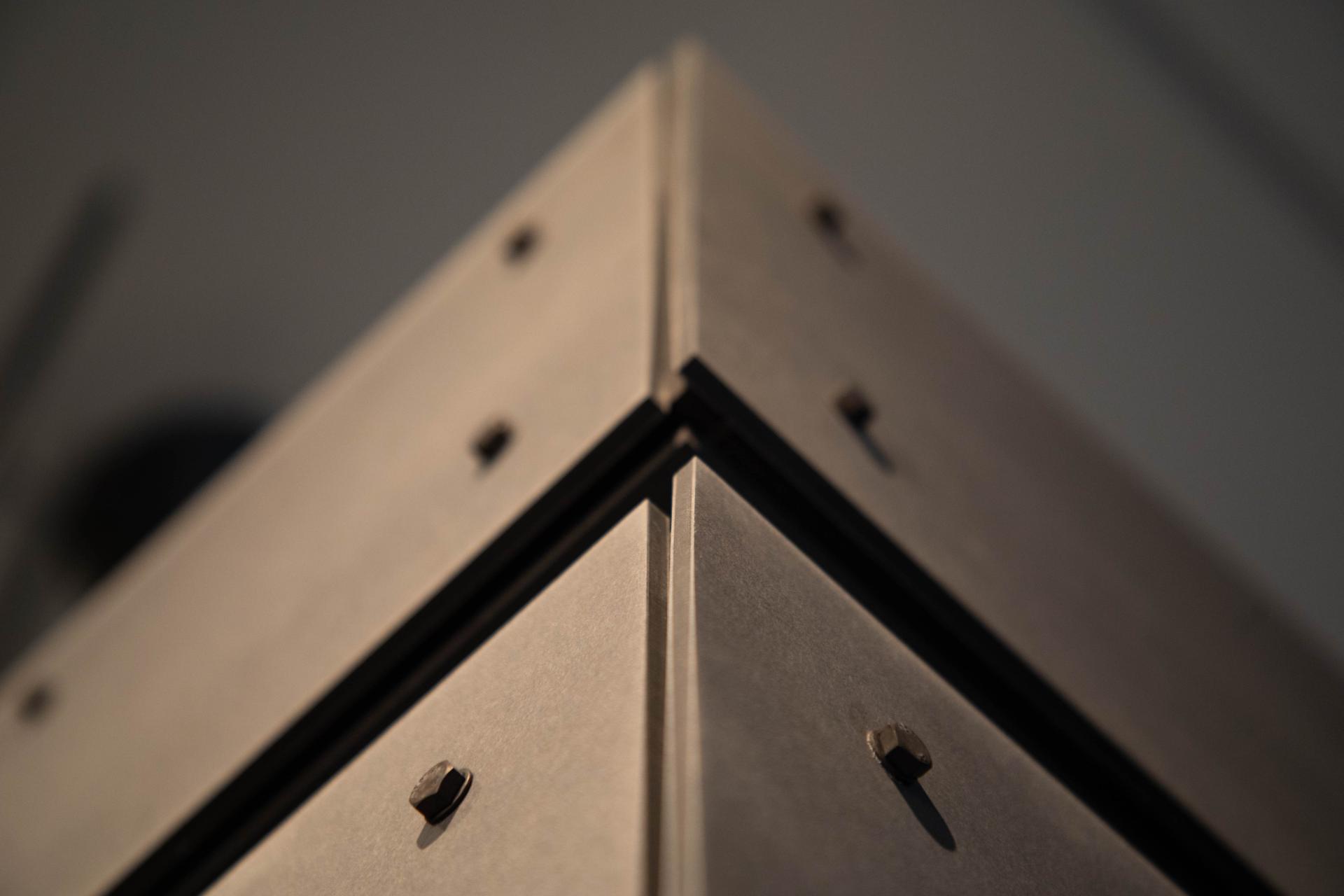 Detailed view of a paper architectural model by John Hejduk, showcasing intricate design elements at the Royal Academy of Arts.