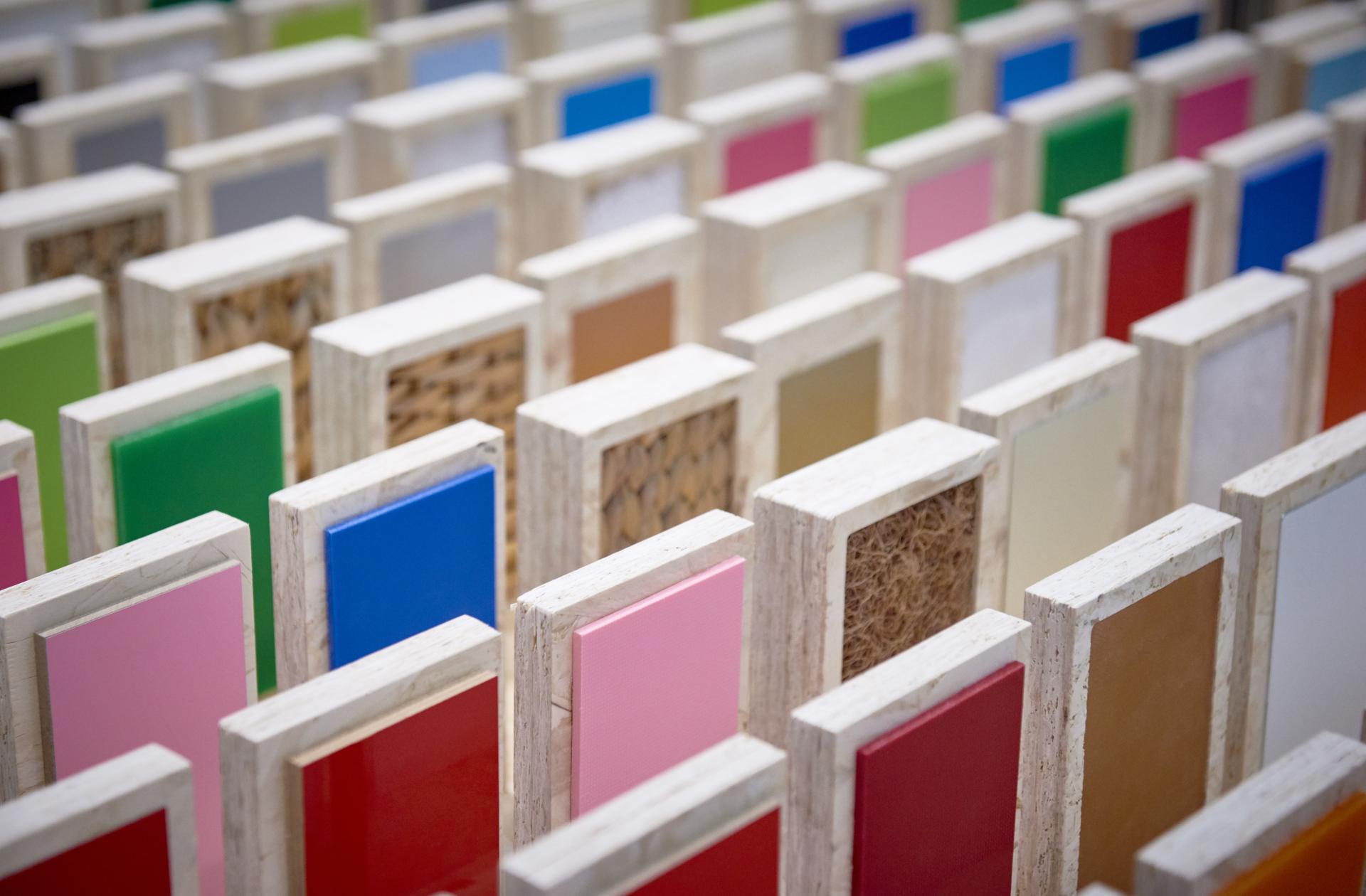 Colorful material samples displayed at the IKEA Museum, highlighting the brand's commitment to design and innovation.