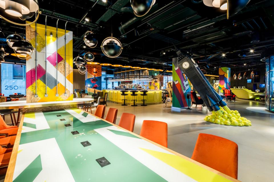 Vibrant interior of the nhow London hotel featuring unique London-inspired decor and a lively artistic atmosphere.