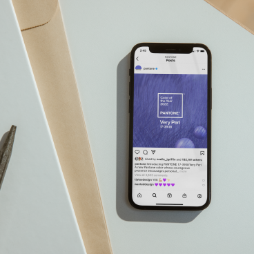 Pantone's announcement of Very Peri, the Colour of the Year 2022, displayed on a smartphone screen.