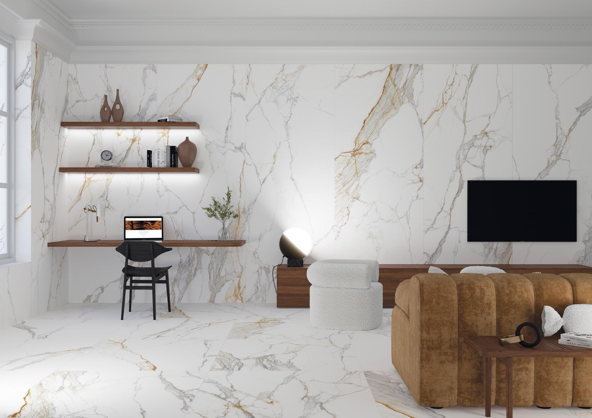 Modern interior featuring elegant marble walls, a stylish desk setup, and contemporary furnishings at Surface Design Show 2023.