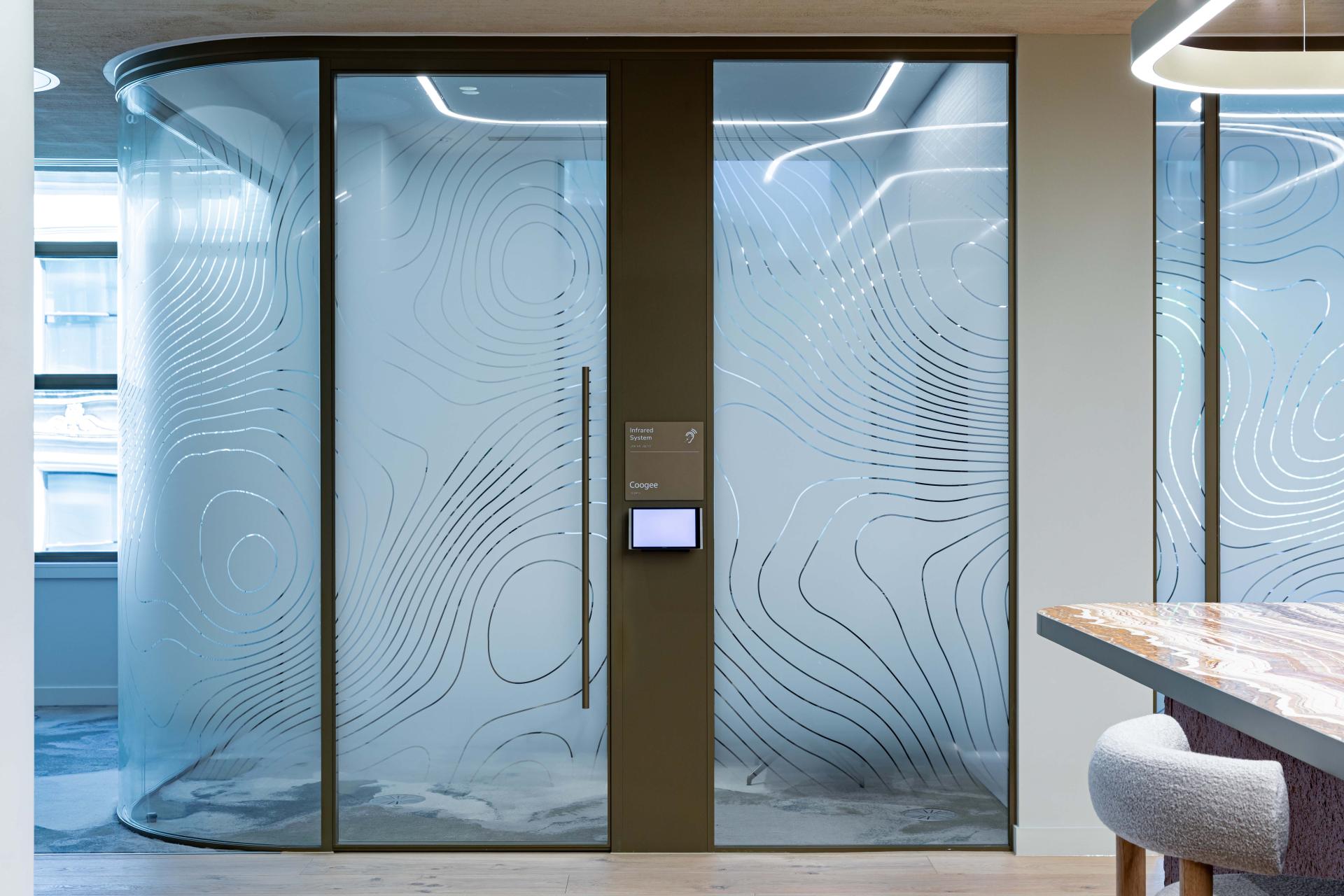 Radii supports tp bennett & Overbury with bespoke bronze framed glazed partitions at banking HQ in London.