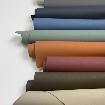 Volar Bio collection showcasing various eco-friendly synthetic fabrics in diverse colors and textures on a white background.