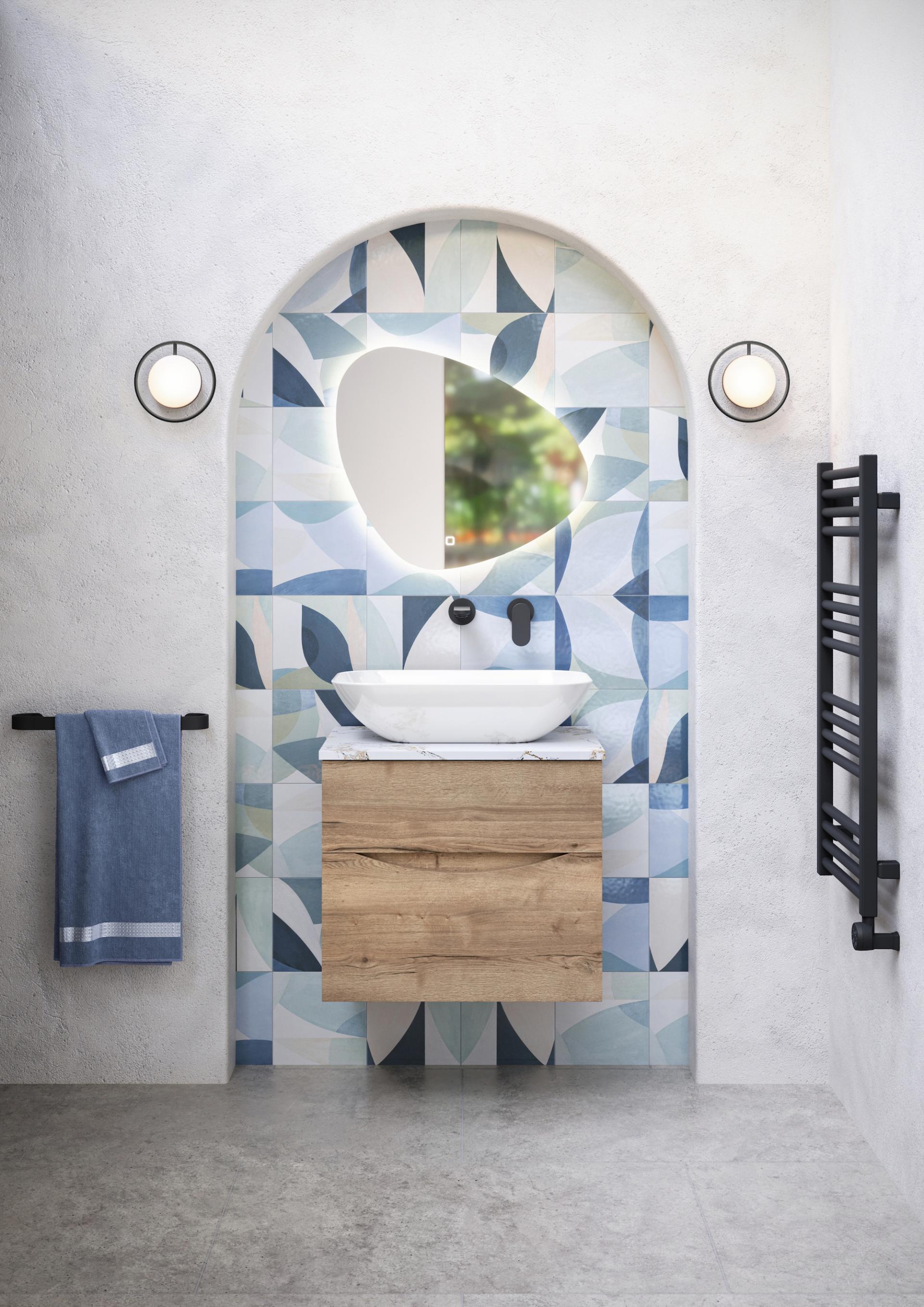 Stylish bathroom featuring a wall-mounted sink, patterned tiles, wooden cabinetry, and modern lighting for a chic washroom design.