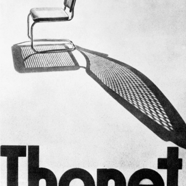 Minimalist Thonet chair casting an intricate shadow, celebrating 200 years of innovative furniture design and Bauhaus aesthetics.
