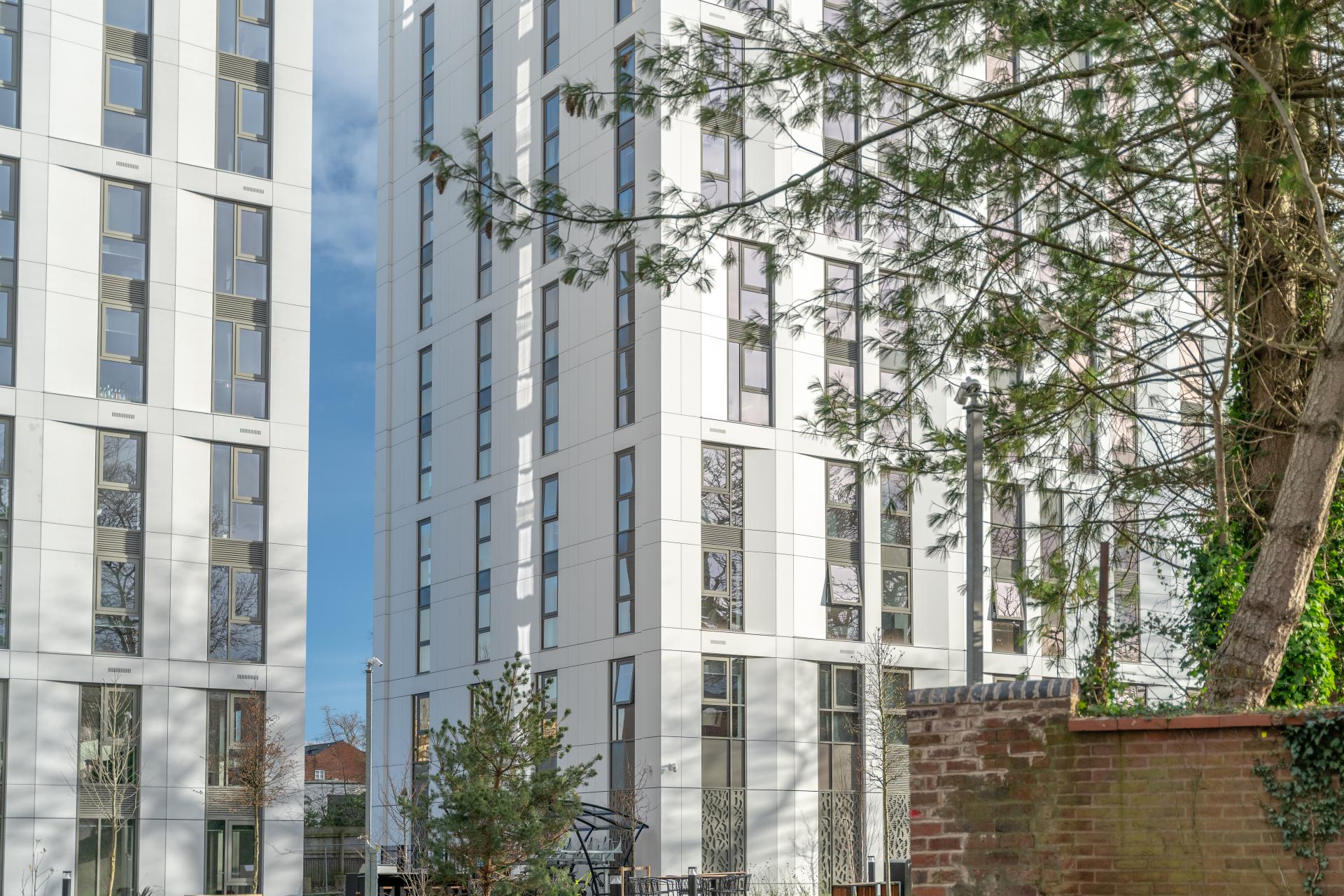 A faceted SureClad® SureStone® façade from Shackerley at New Garden Square.