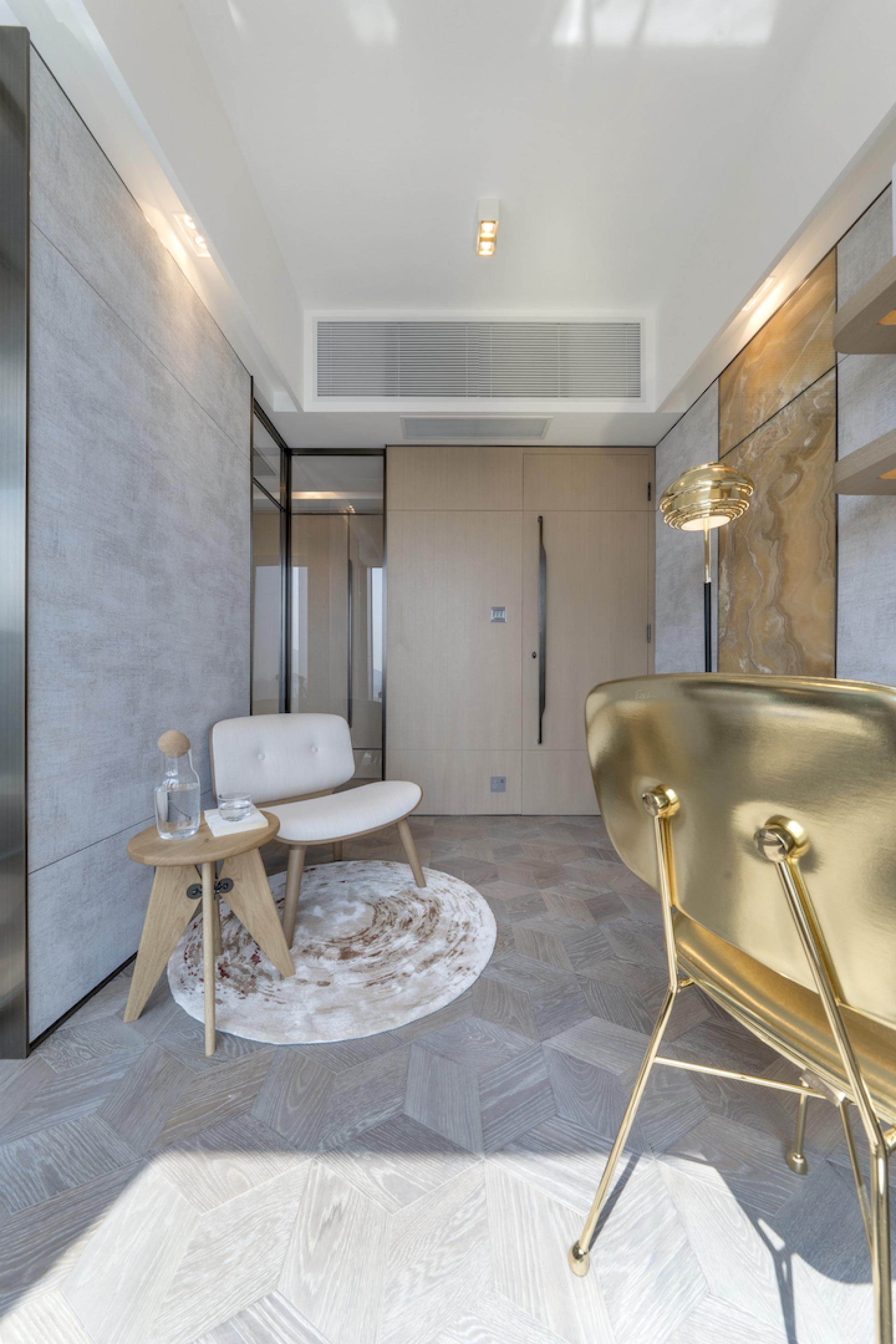 Stylish Hong Kong apartment interior featuring minimalist furniture, elegant textures, and a harmonious blend of modern design and natural elements.