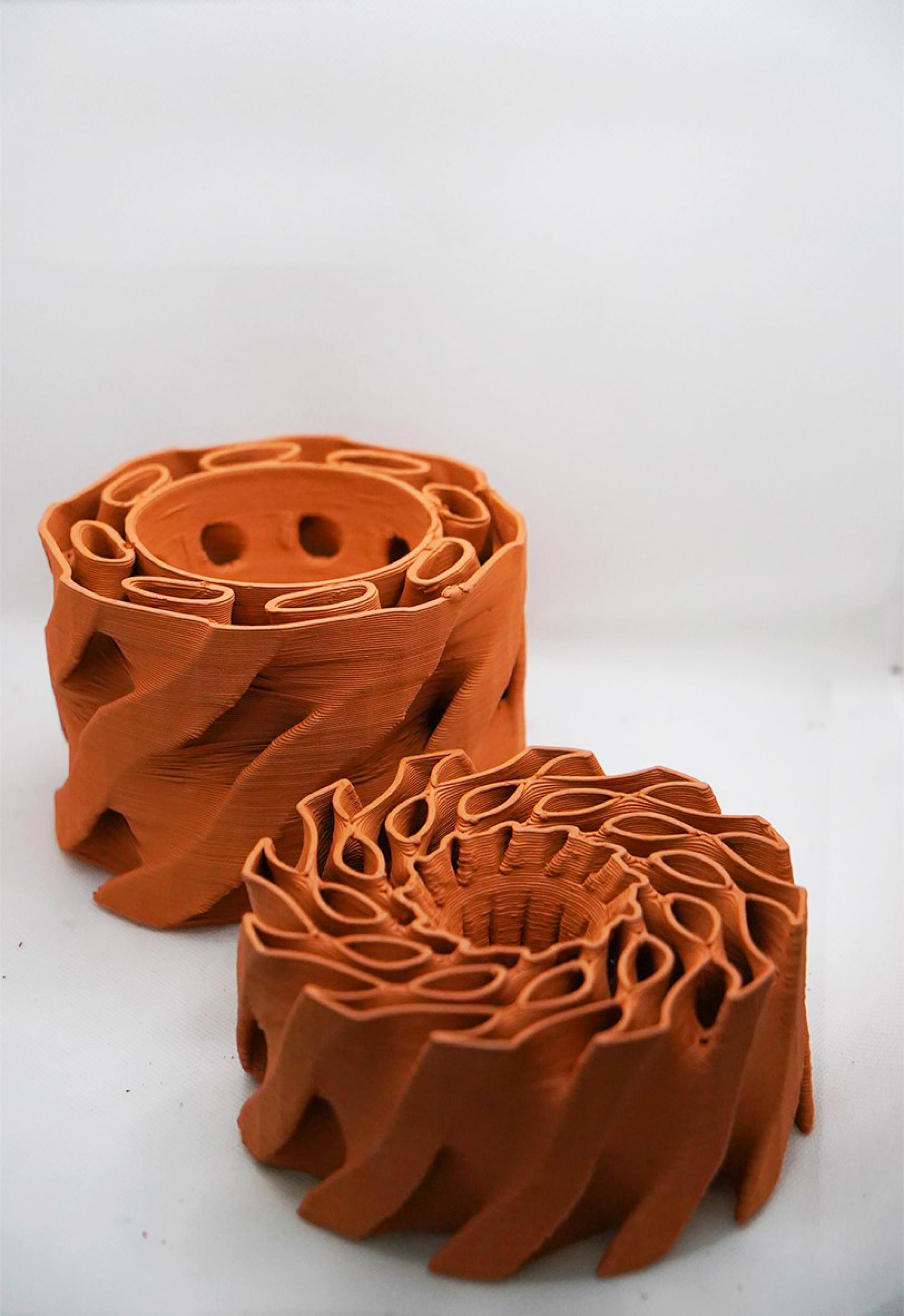 Clay 3D printed models designed for building cooling, showcasing innovative architectural techniques by Rameshwari Jonnalagadda.