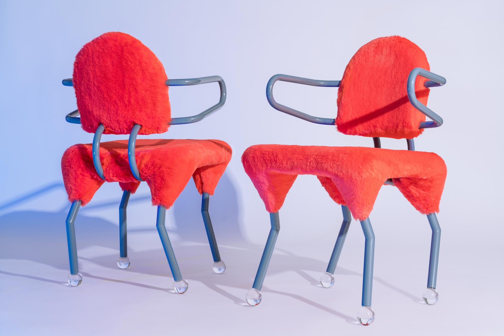 Bold red chairs with playful designs, featuring furry upholstery and unique metal frames, showcasing Memphis design aesthetics.