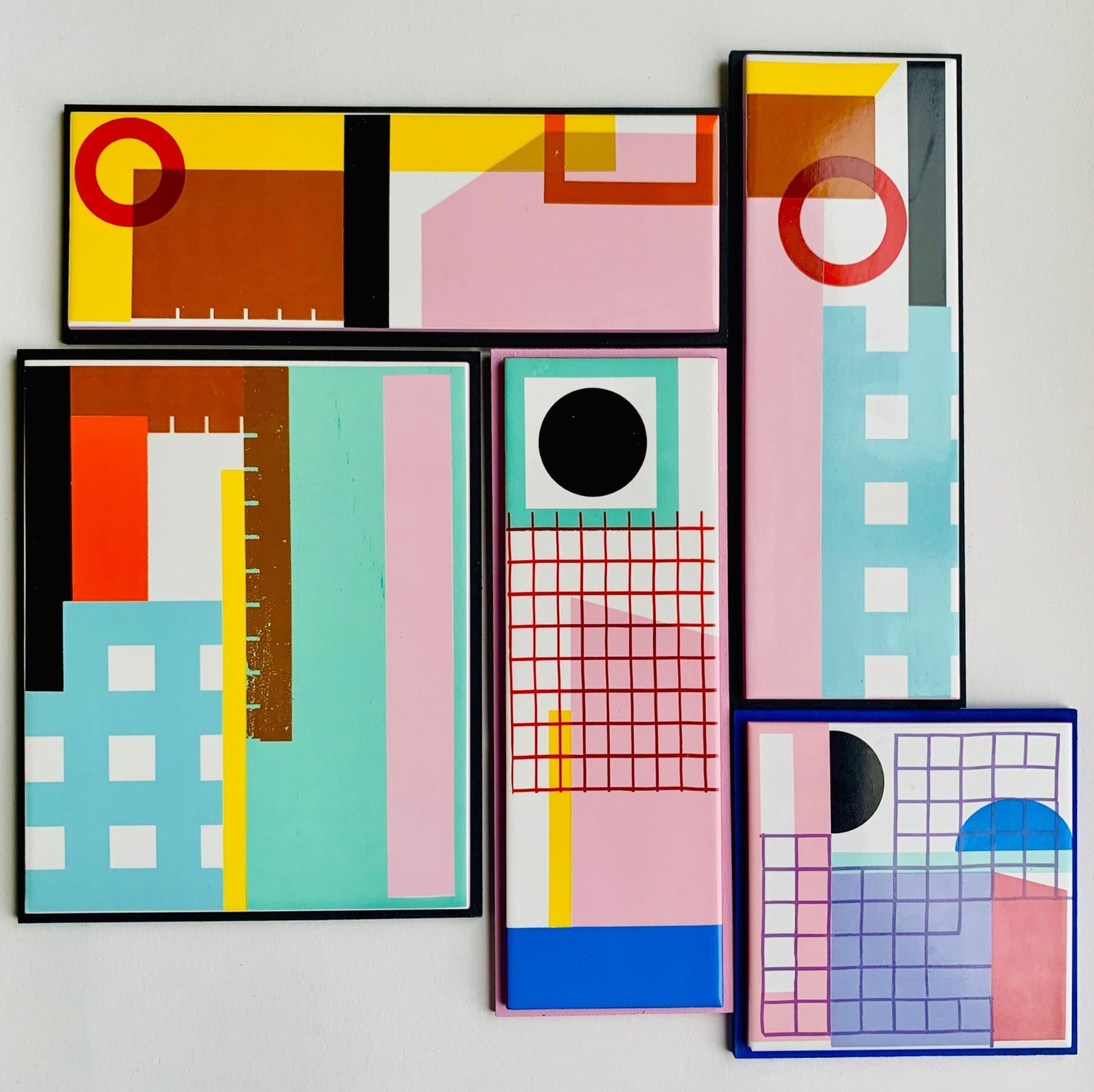 Colorful geometric ceramic art pieces by Laura Lightbody, showcasing vibrant patterns and everyday shapes.