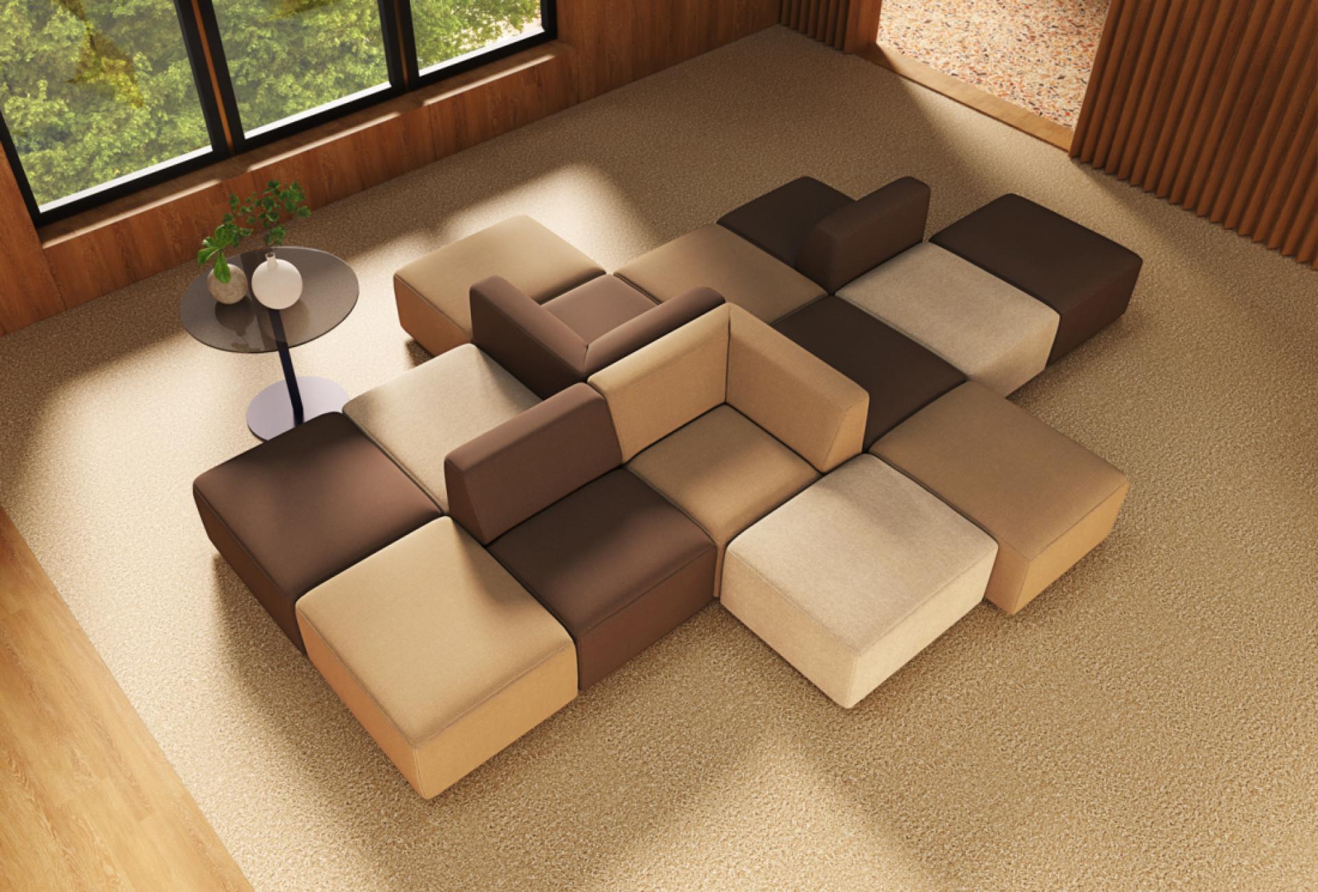 Contemporary sofa arrangement featuring brown and beige modular cushions in a stylish interior setting.