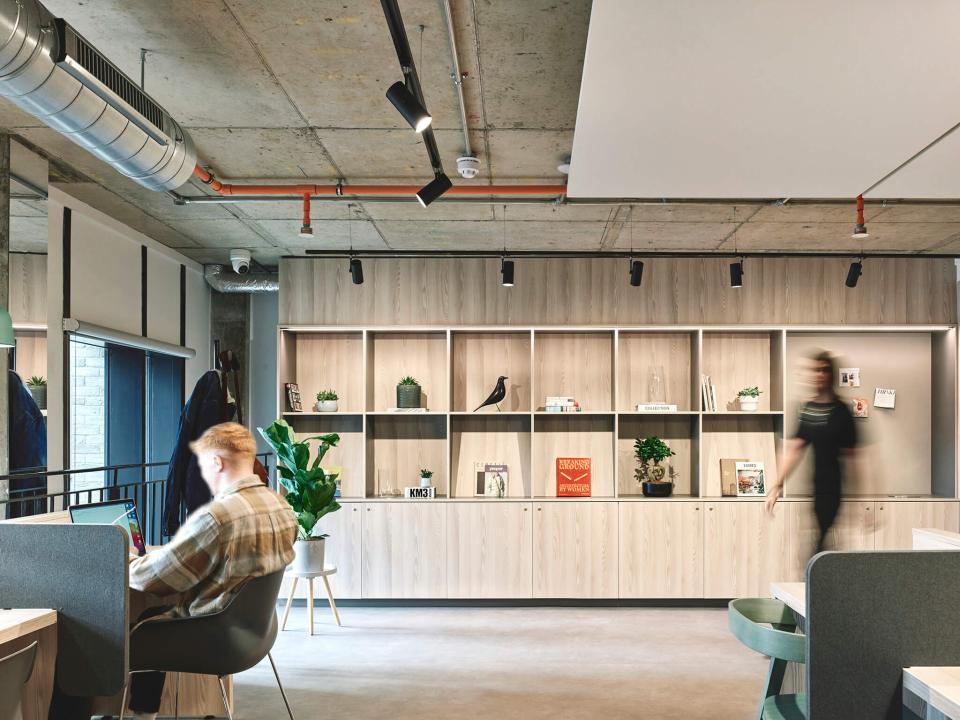 Modern student living space at The Tannery in Leicester, featuring stylish furnishings and collaborative workspace elements.