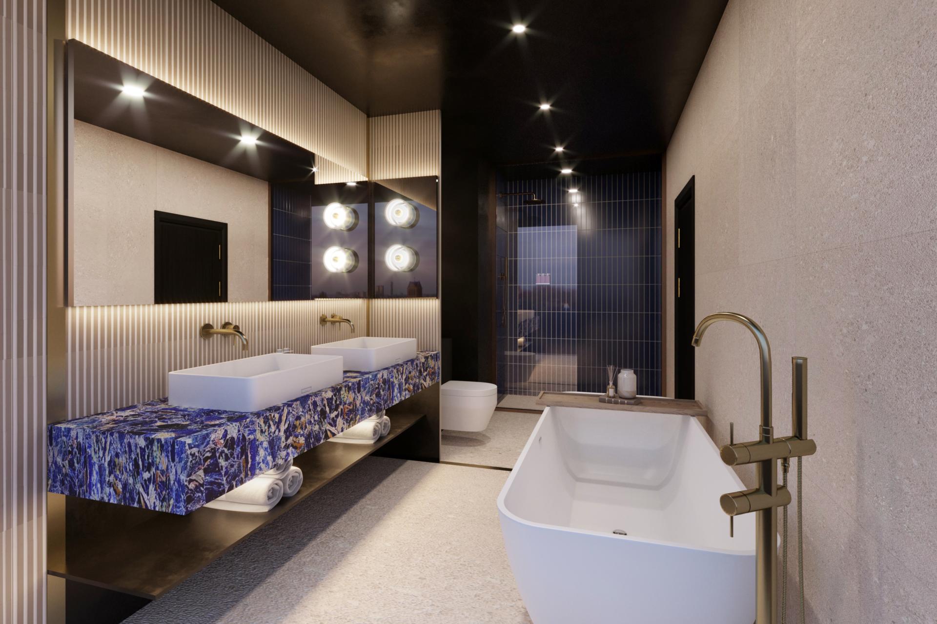 Luxurious hotel bathroom featuring double sinks, a freestanding tub, and modern design elements in the new Tribe hotel.
