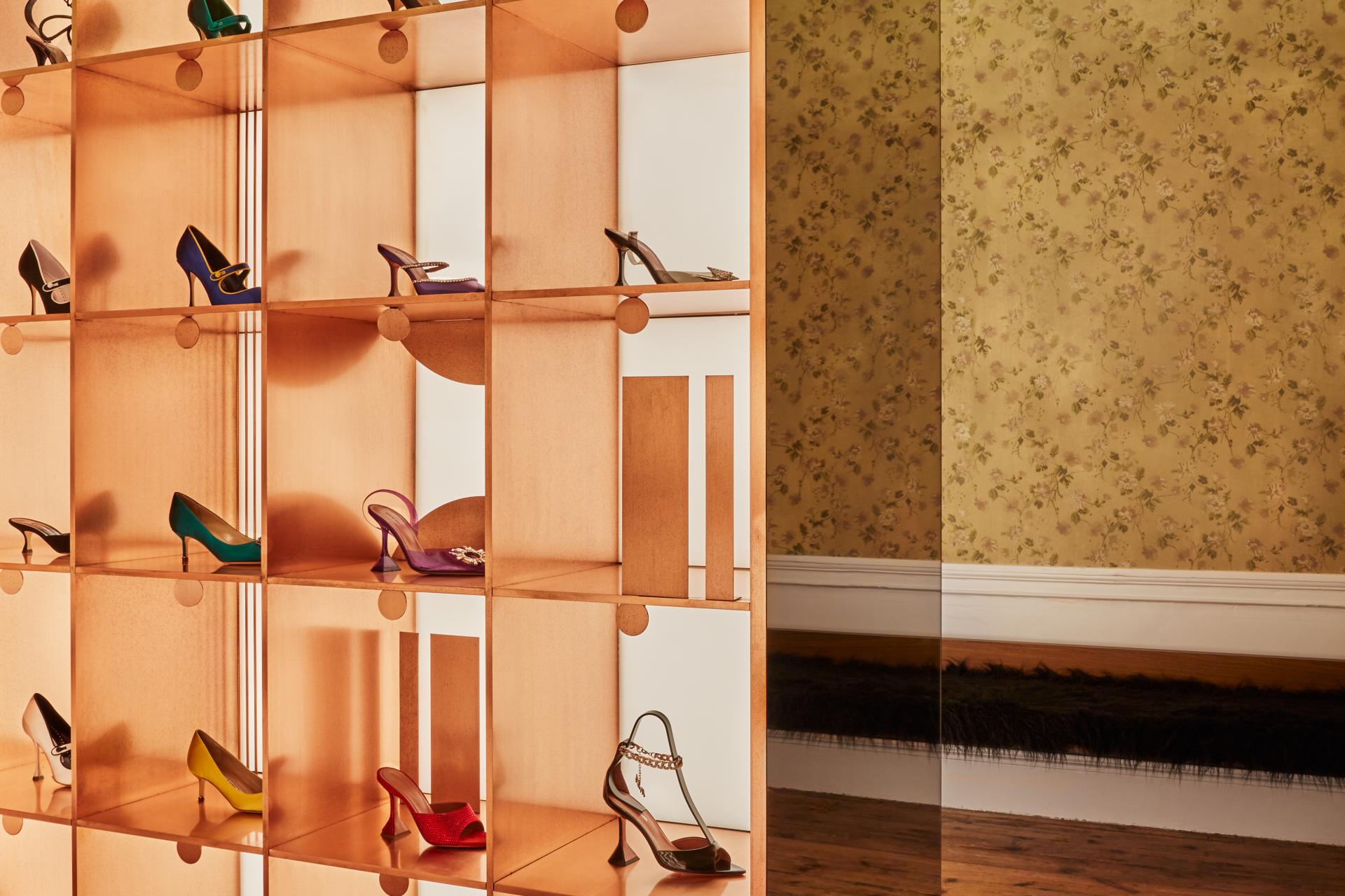 Stylish shoe display in Browns, London, highlighting Nulty's sophisticated retail lighting design for luxury fashion.