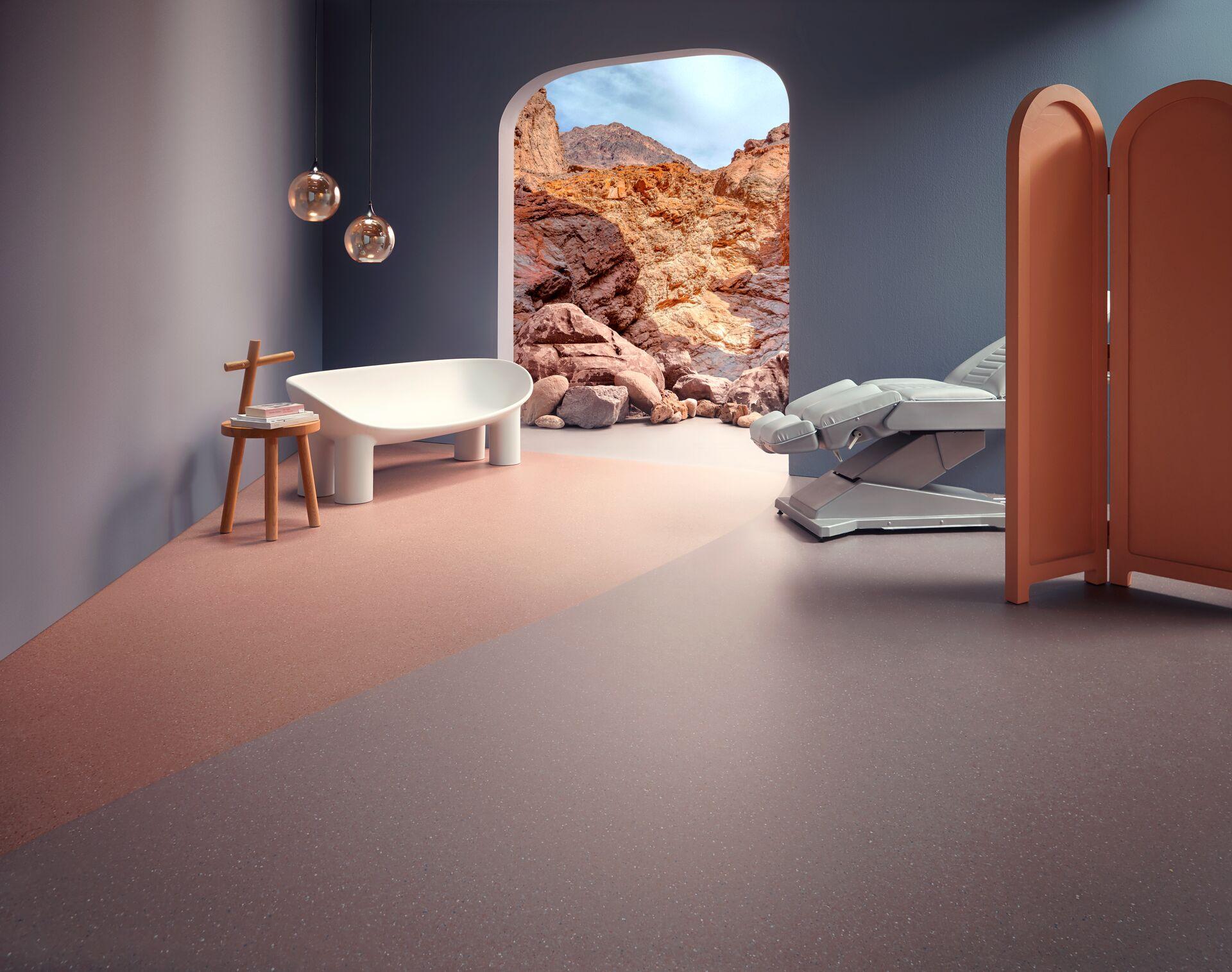 Stylish healthcare interior featuring Forbo's homogeneous vinyl flooring, modern furniture, and a calming natural backdrop.