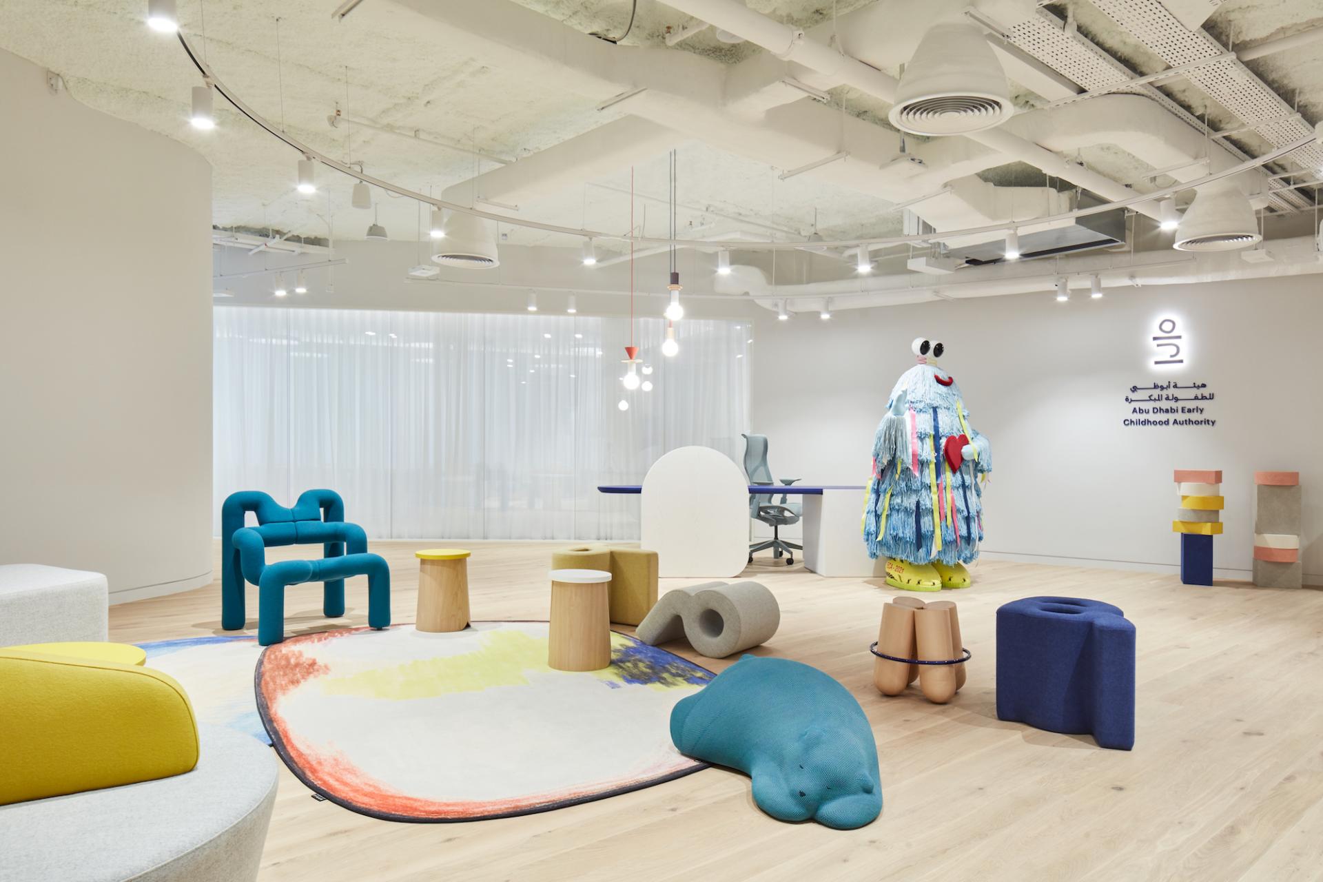 Colorful, playful furniture and art create an engaging environment at Abu Dhabi's Early Childhood Authority designed by Roar Studio.