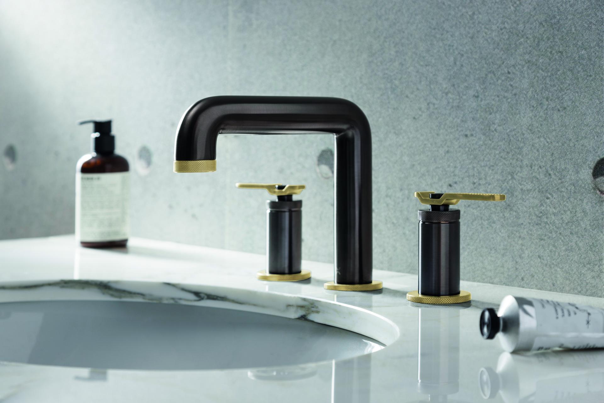 Stylish brassware sink faucet from Crosswater's UNION Mixage collection, featuring an industrial minimalist design on a marble countertop.