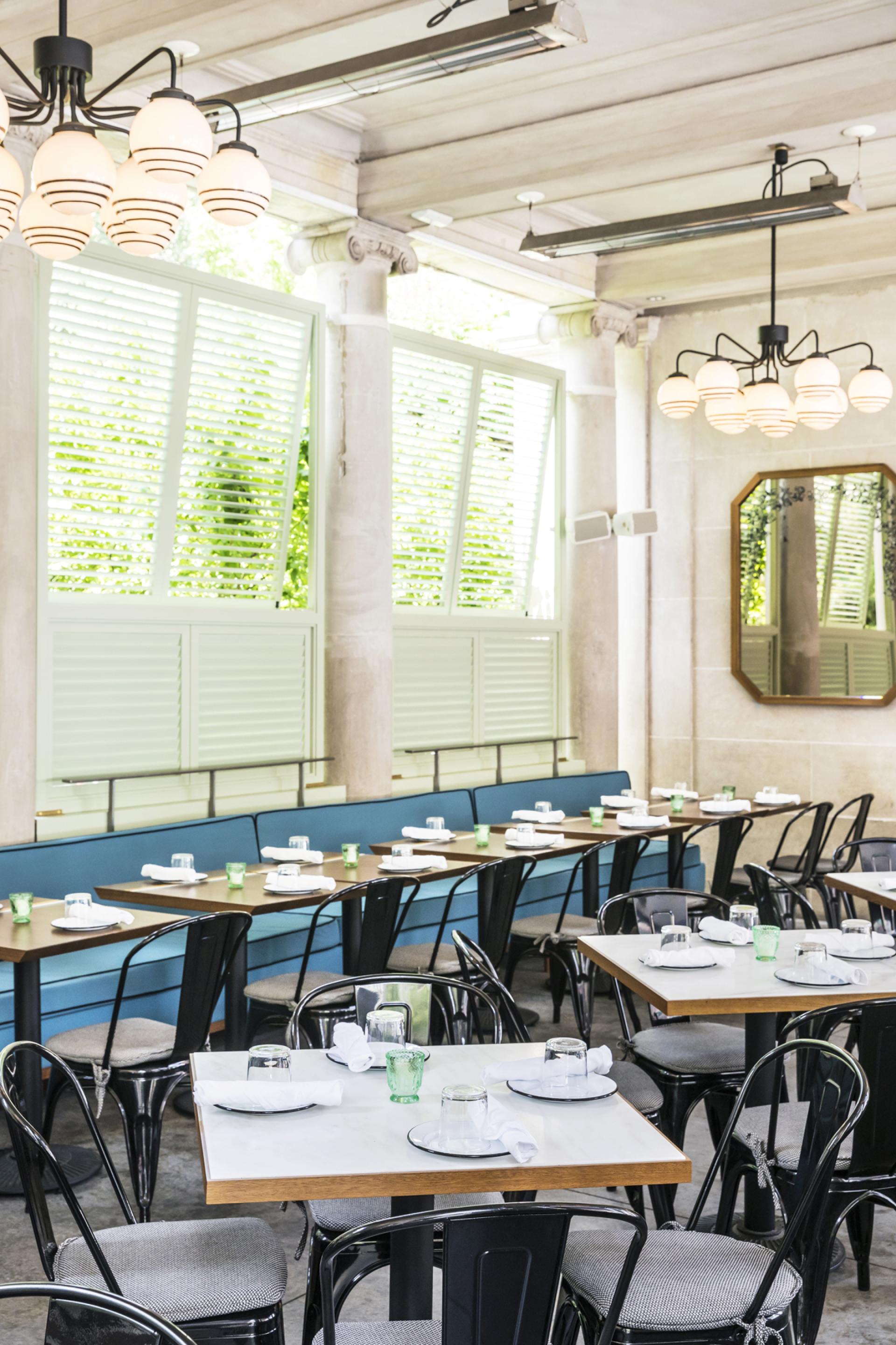 Modern dining area at Bocce restaurant in Union Square, featuring stylish furniture and bright natural light.