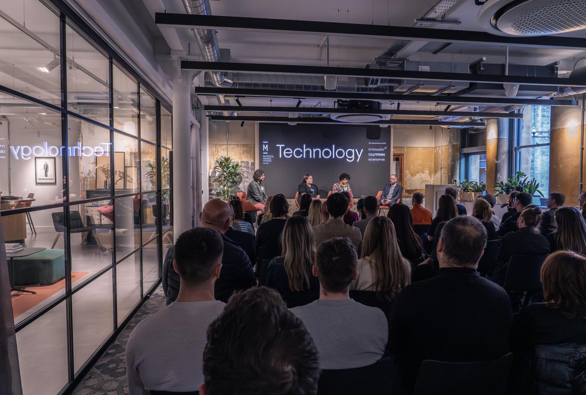 Engaged audience attending a technology discussion panel at Material Source Studio, highlighting modern innovations and ideas.