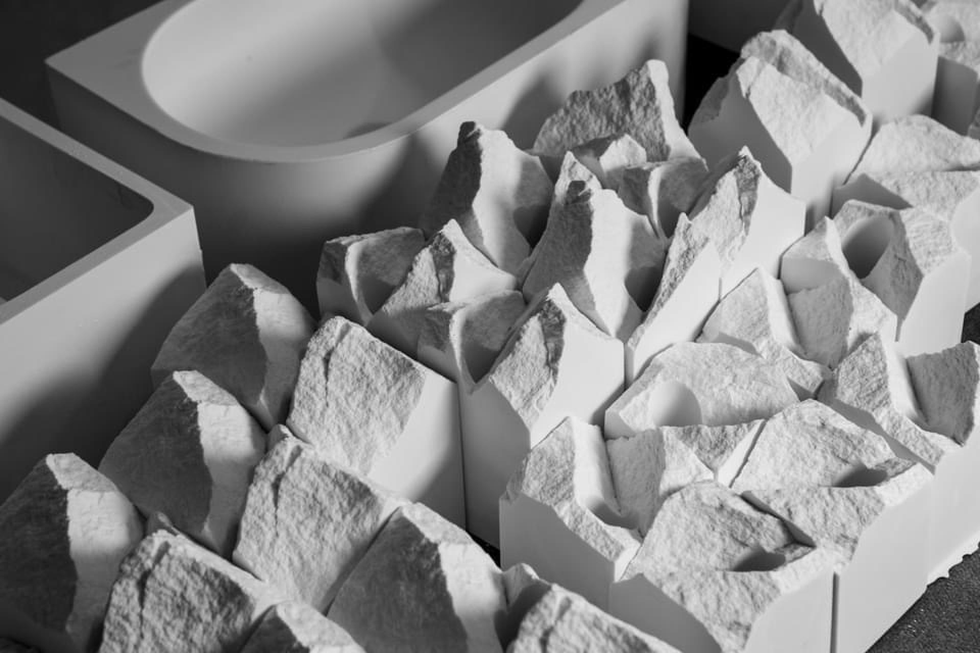 Innovative textured materials from the Baltics showcasing modern design and craftsmanship in a monochrome arrangement.