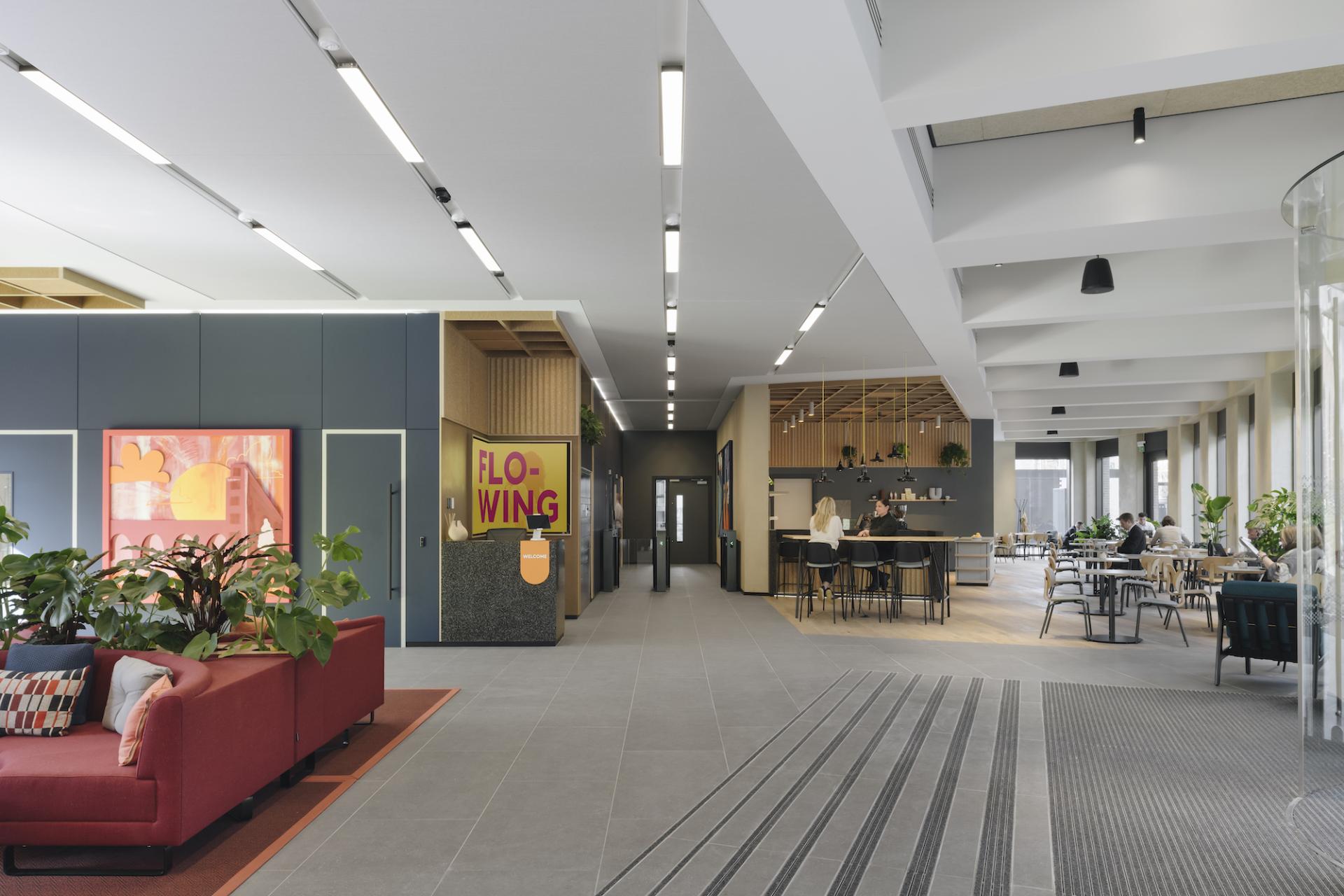 Modern interior design at Globe Point in Leeds featuring open spaces, plants, and collaborative work areas by Ekho Studio.