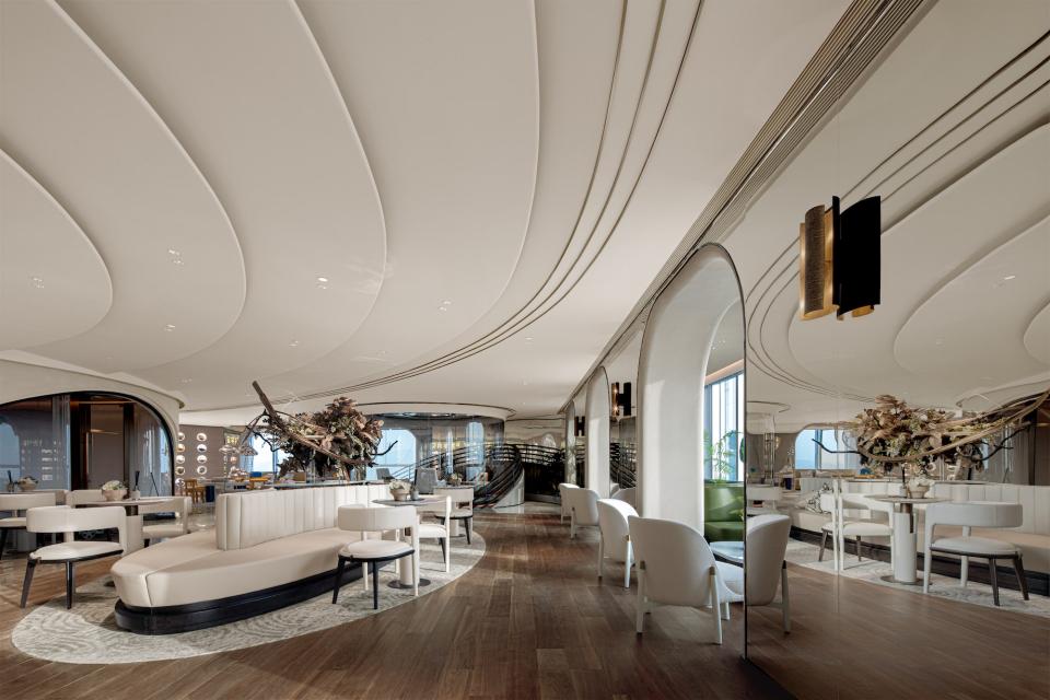 Sophisticated workspace design by Karv One featuring elegant furniture and modern decor in Wenzhou's tallest tower.