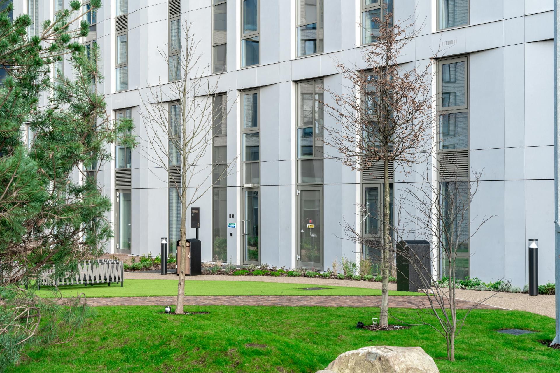 A faceted SureClad® SureStone® façade from Shackerley at New Garden Square.