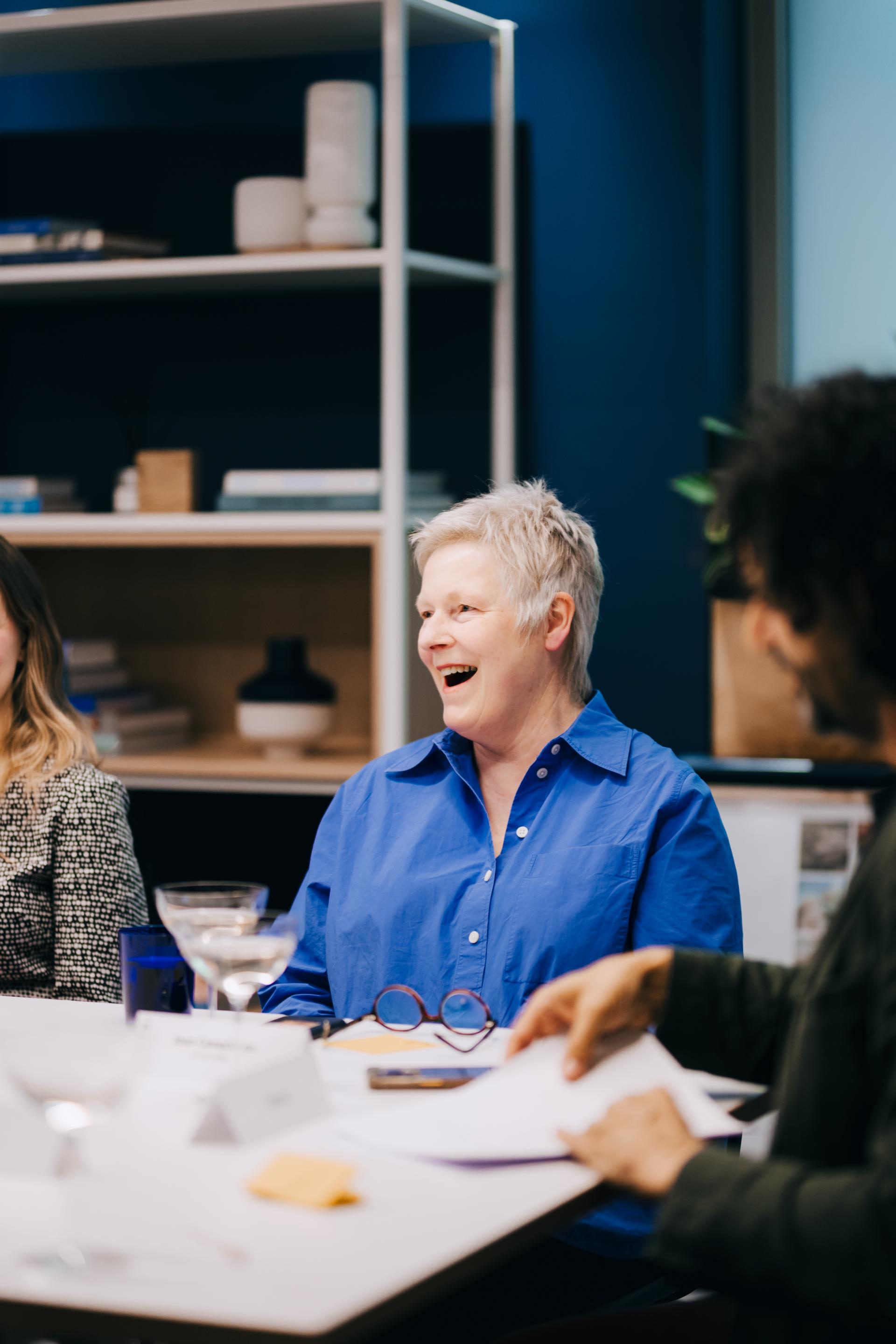 Participants engaging in a roundtable discussion on neurodiversity, highlighting the importance of flexibility in diverse workplaces.