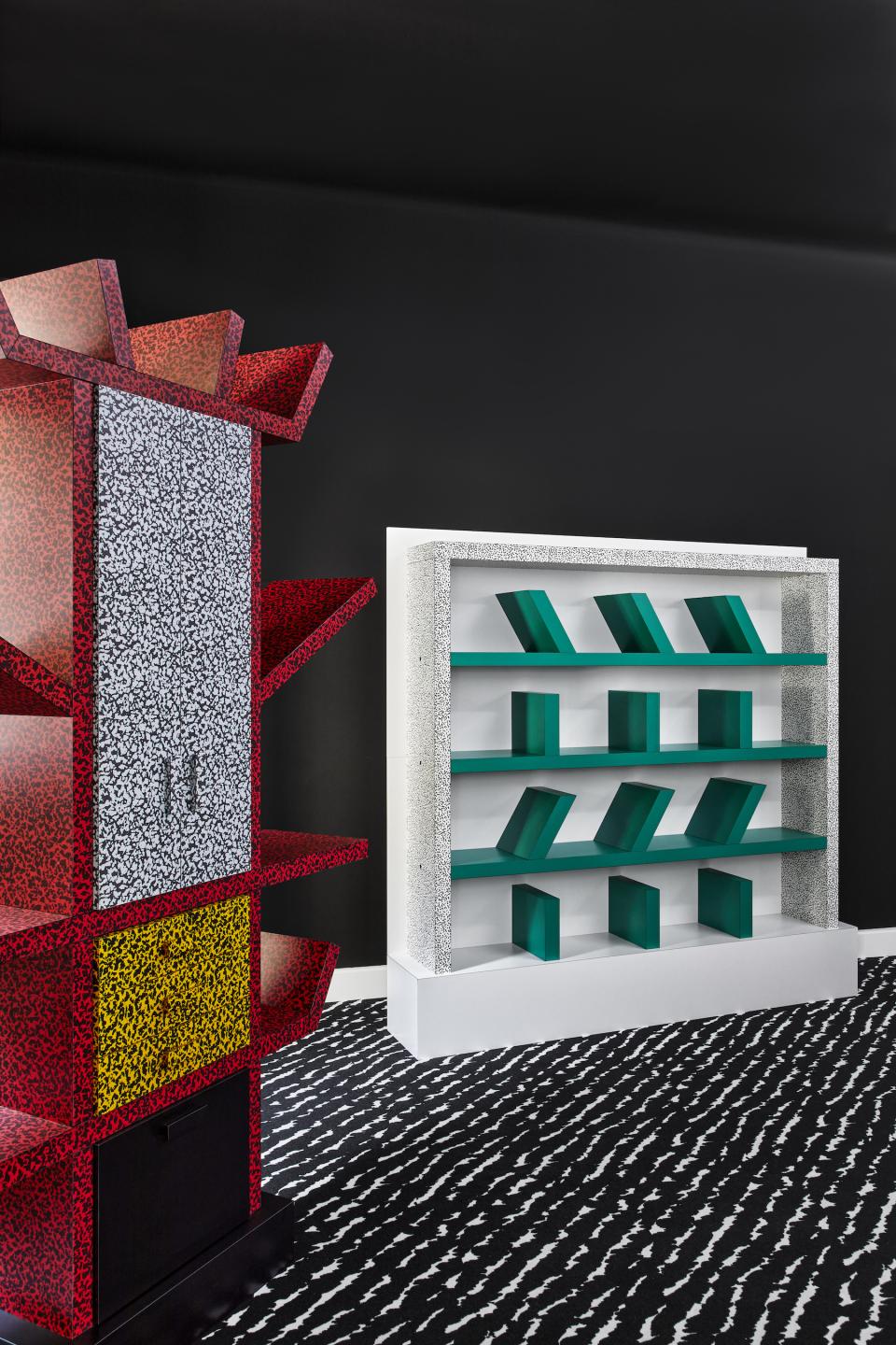 Colorful Memphis Milano furniture pieces in a modern interior setting, featuring unique geometric designs and vibrant colors.