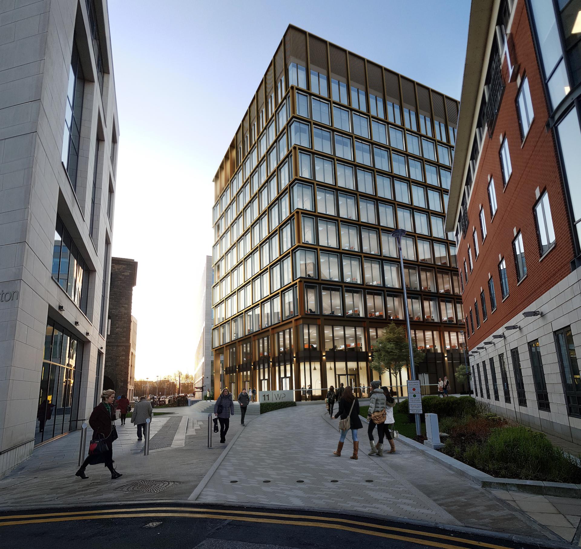Modern office buildings at Wellington Place, showcasing sustainable design and vibrant urban activity in Leeds.