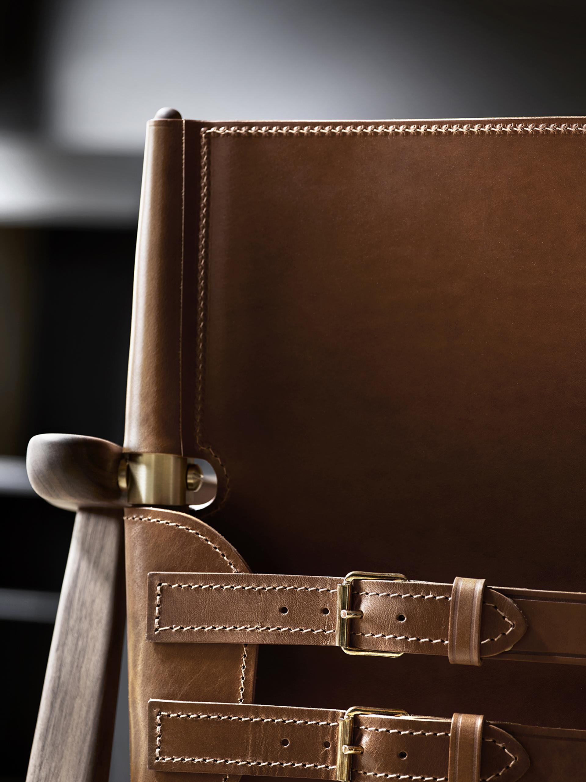 Close-up of the Huntsman Chair, showcasing its elegant leather detailing and sturdy wooden frame, designed by Børge Mogensen.