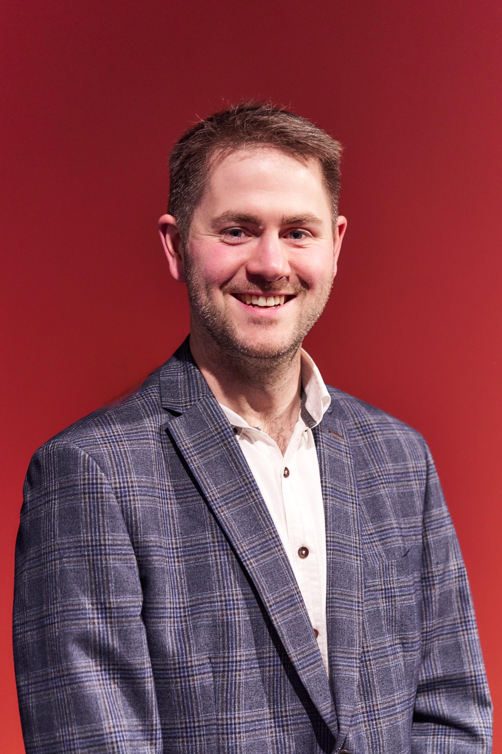 Professional speaker at Glasgow Property Outlook seminar, promoting discussions on residential mix in the city.