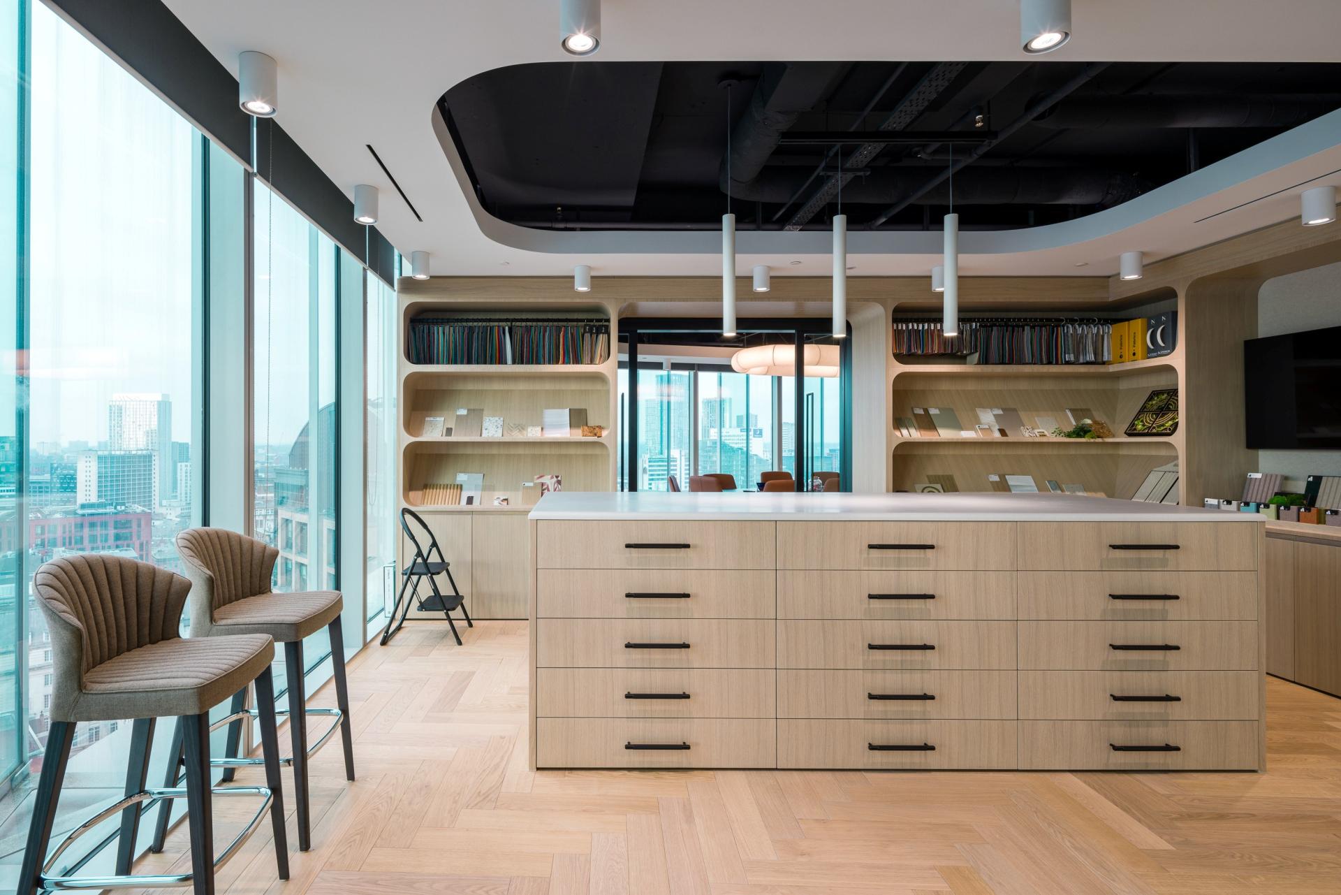 Collaboration between SpaceInvader and Overbury culminates in deeply detailed Manchester workspace.