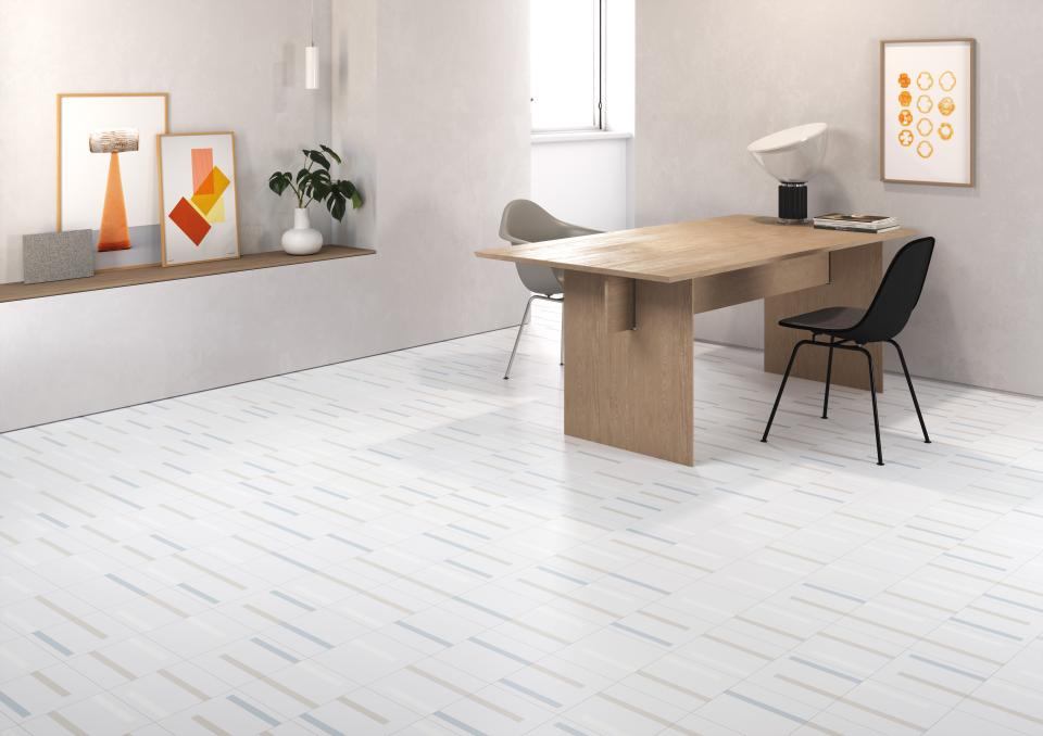 Stylish interior with wooden table, modern chairs, and Dash ceramic tiles featuring grid-like patterns in soft colors.