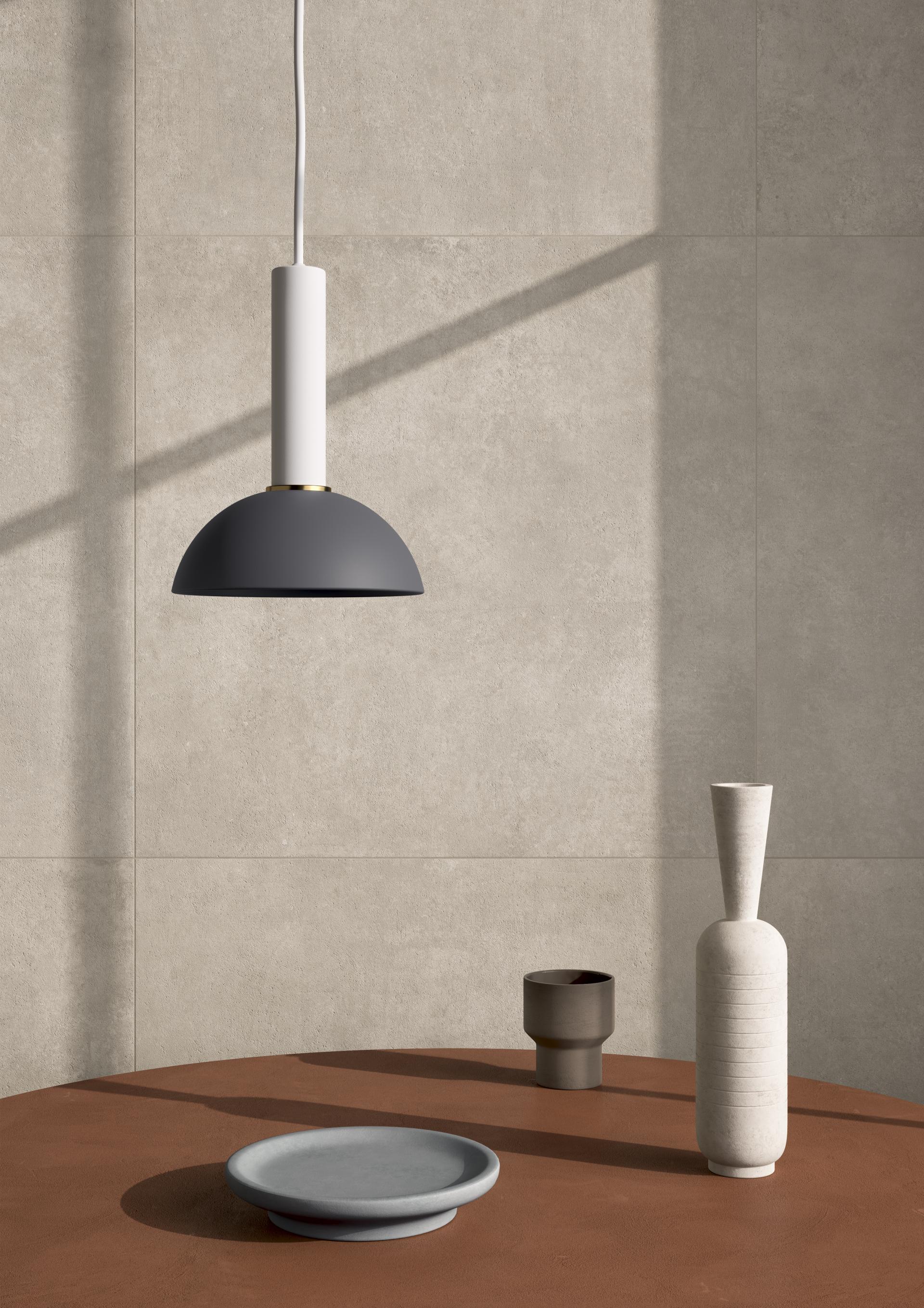 New VitrA lighting and ceramic decor featuring modern vases and textured tiles showcased at Cersaie 2018.