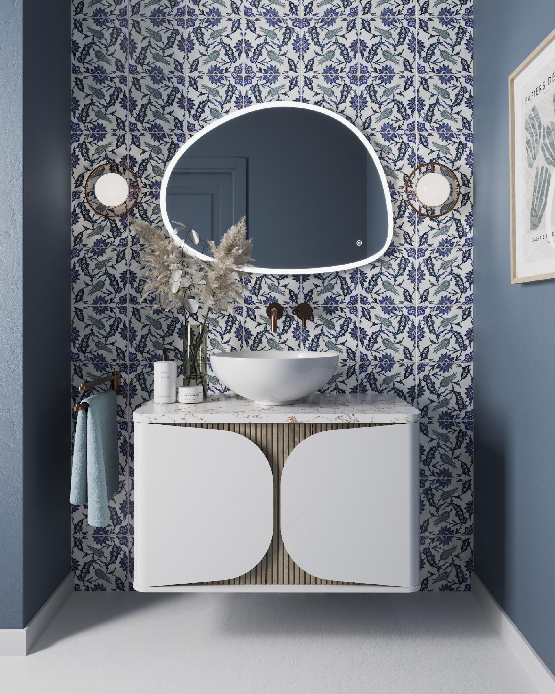 Stylish bathroom featuring a white basin, decorative tiles, modern lighting, and elegant storage solutions for contemporary washroom design.