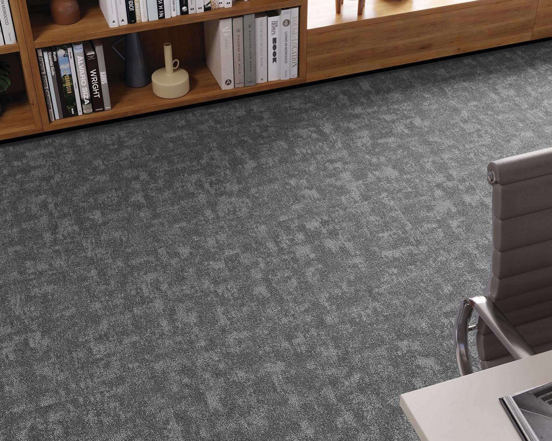 Textured gray flooring from Forbo's Tessera Union collection, enhancing modern office spaces with harmony and style.