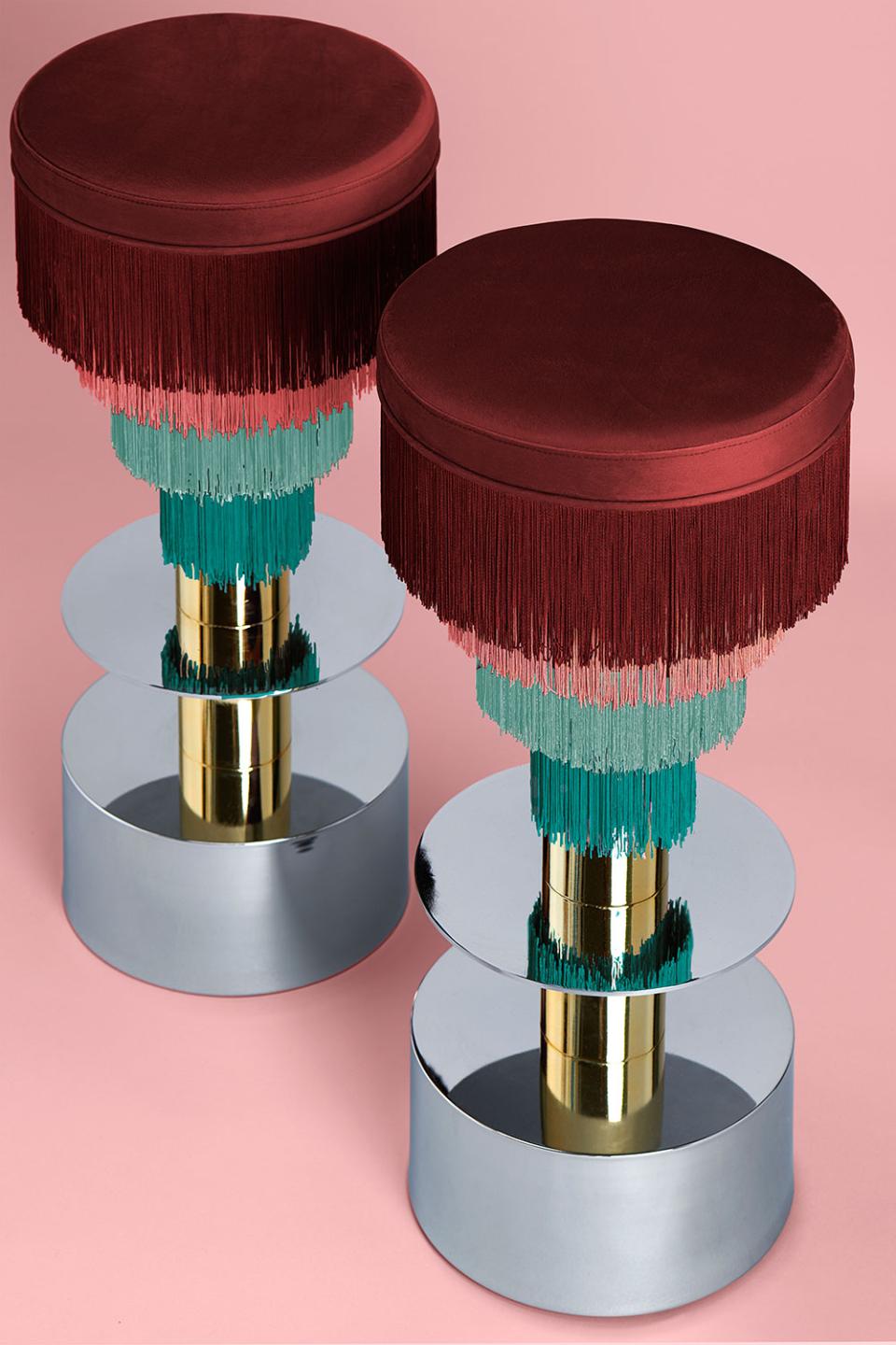 Stylish stools by Masquespacio featuring vibrant fringes, reflecting colorful design aesthetics and modern elegance for Houtique.