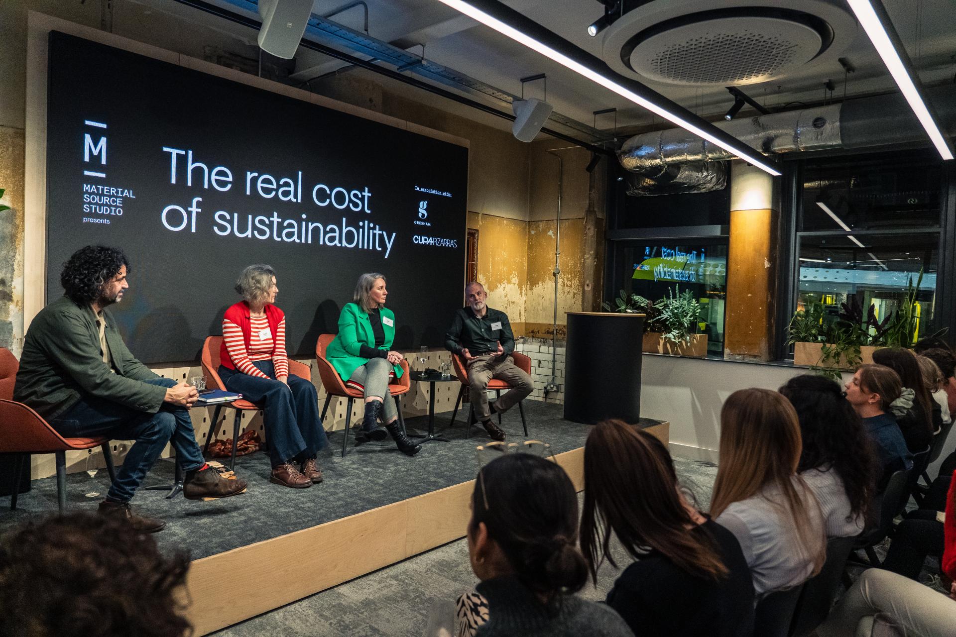 Panel discussion on sustainability at the Material Source Studio seminar in Manchester, featuring industry experts sharing insights.