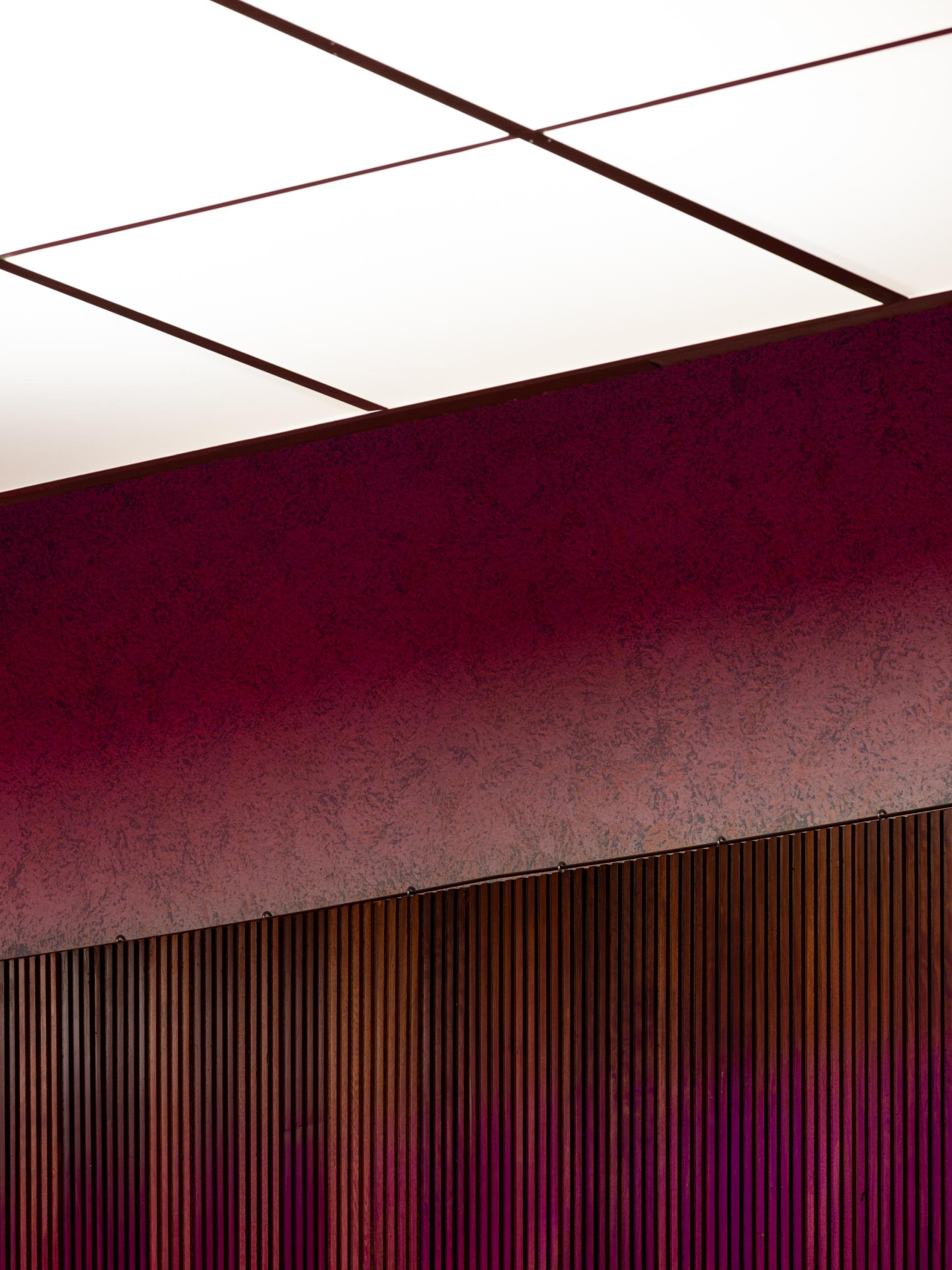 Modern interior design featuring colorful layered textures, highlighting the transformation of New Century into a community venue.