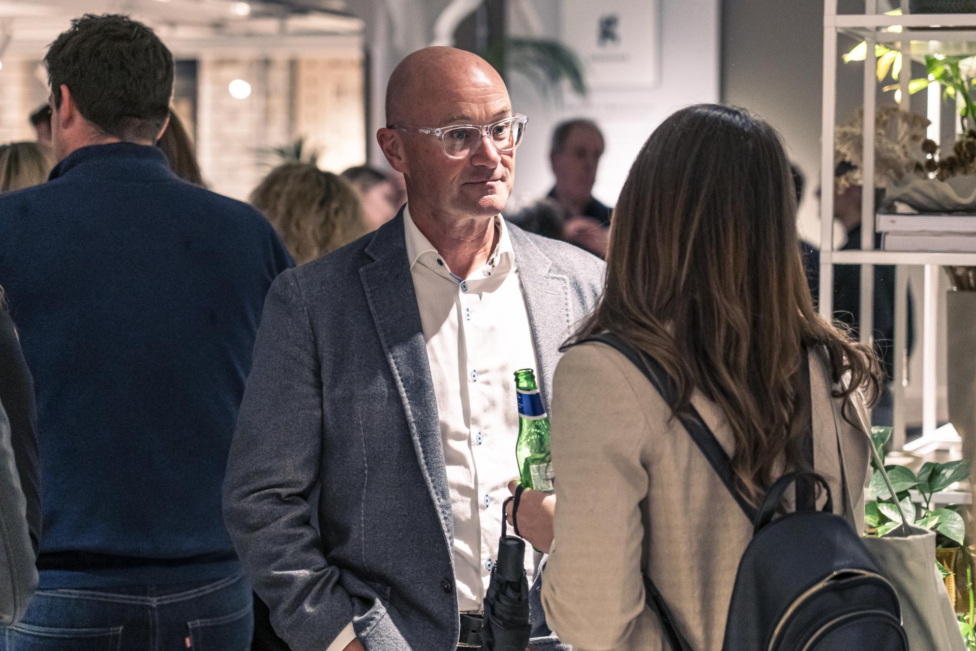 Attendees engaging in discussion at the Future of Residential seminar, showcasing key insights on modern living trends.