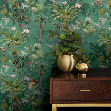 Vivid nature-inspired wallcovering featuring tropical plants and wildlife, showcased alongside a wooden table and decorative plants.