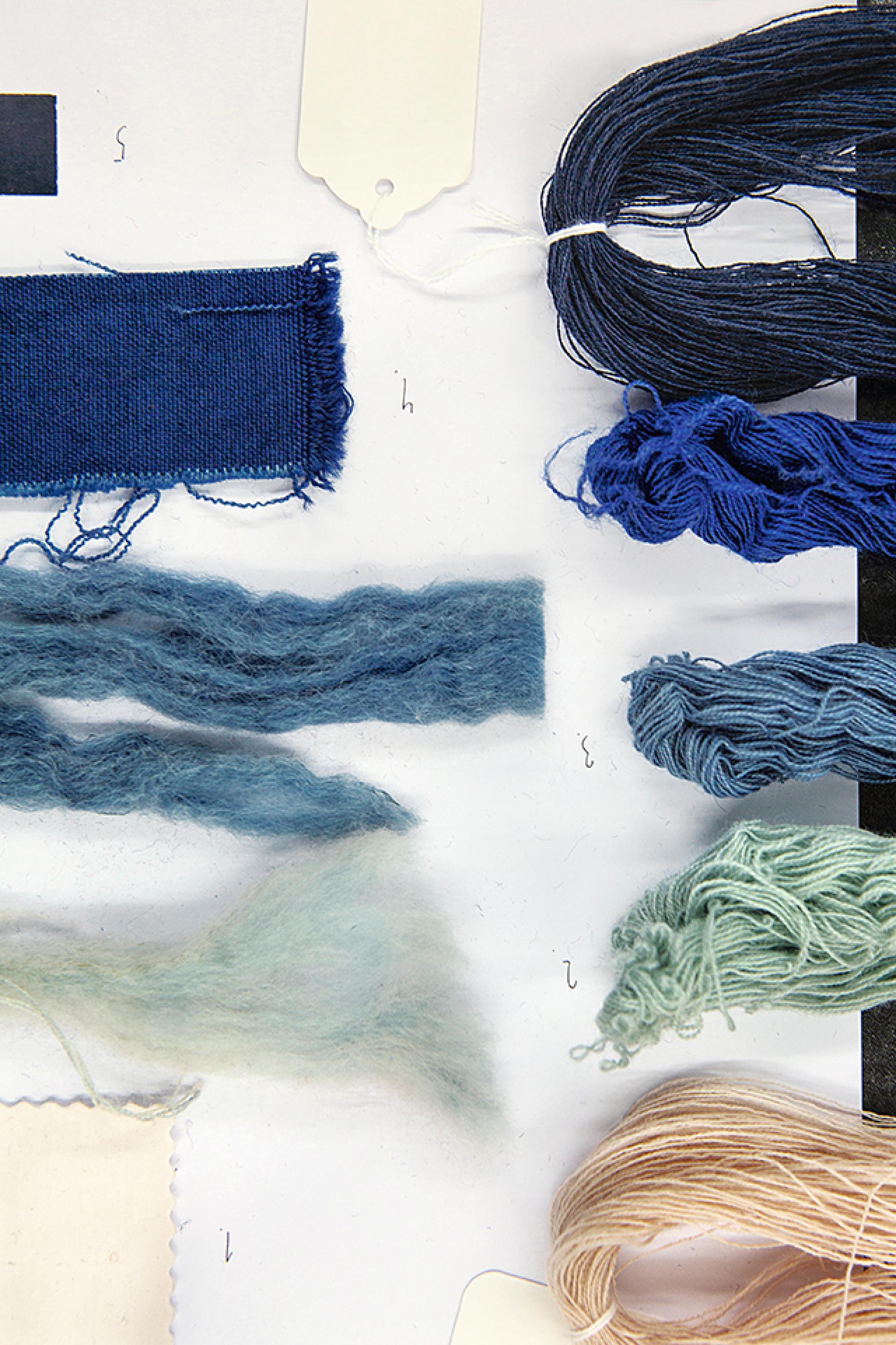 Textiles samples in various shades of blue and green, showcasing Kvadrat's innovative approach to color and material design.