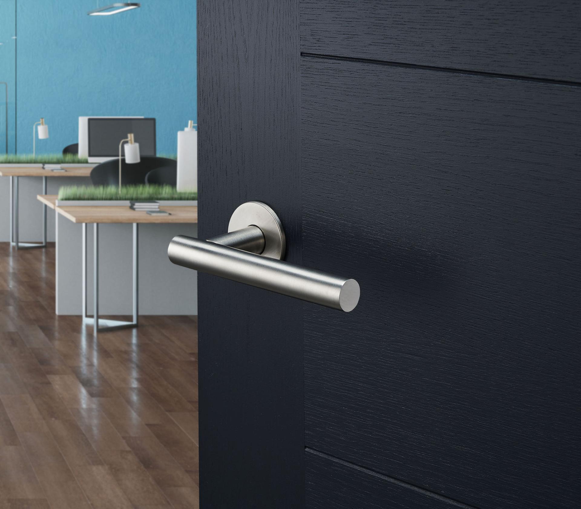 Antimicrobial door handle leading into a modern office space, showcasing Allgood's innovative Contego collection.