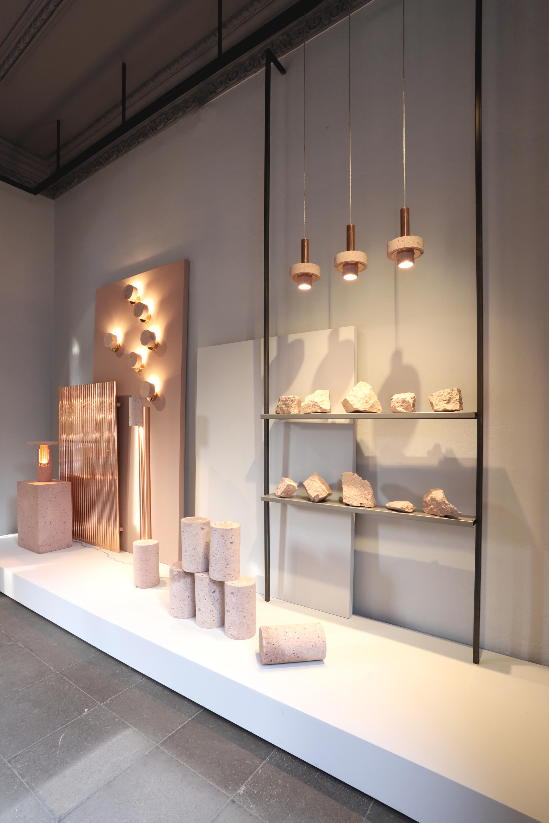 Showroom display featuring innovative lighting and local materials, showcasing Davidpompa's unique design aesthetic in Mexico City.