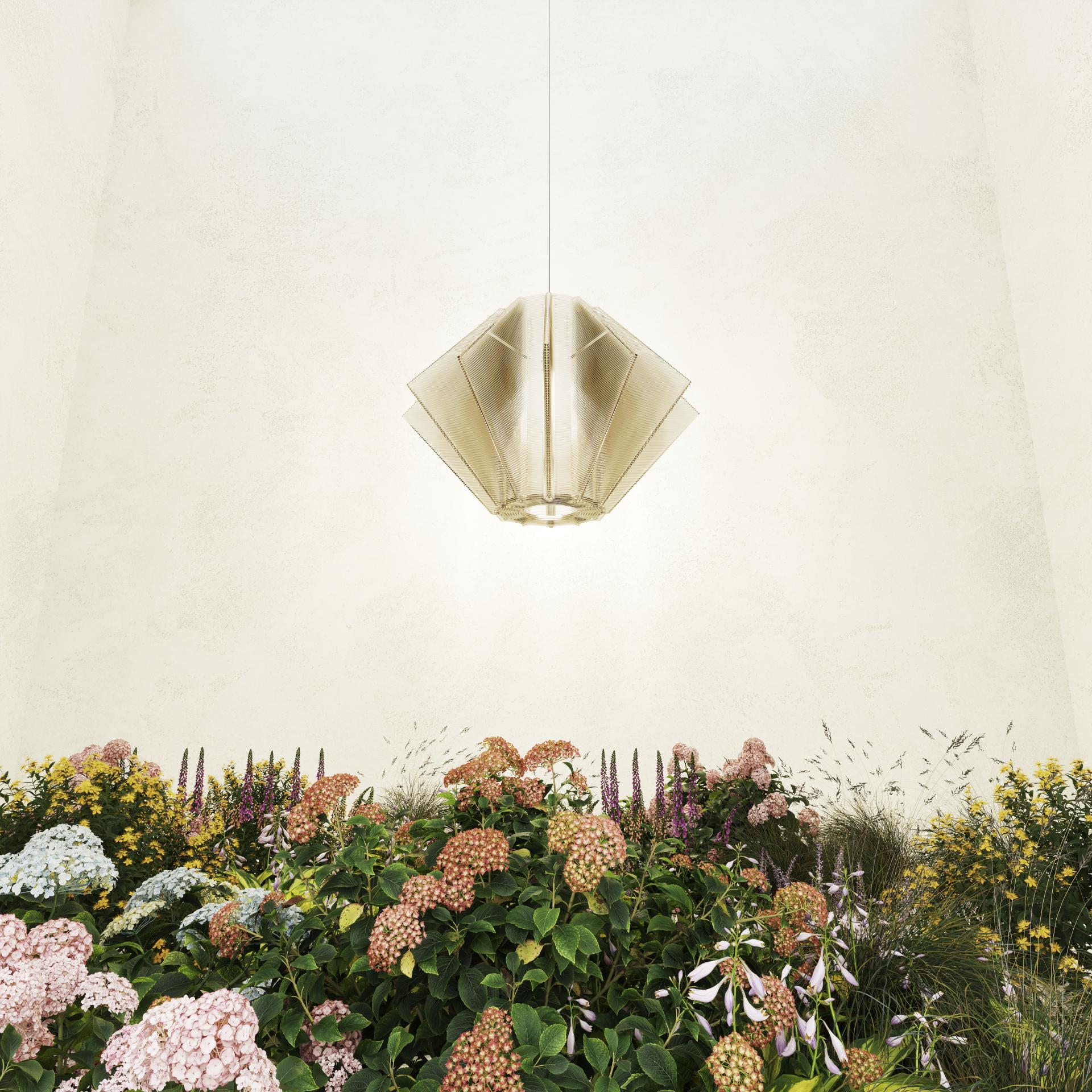 Stylish hanging light fixture above vibrant, colorful floral arrangement in a minimalistic design space at Dundee Design Festival 2024.