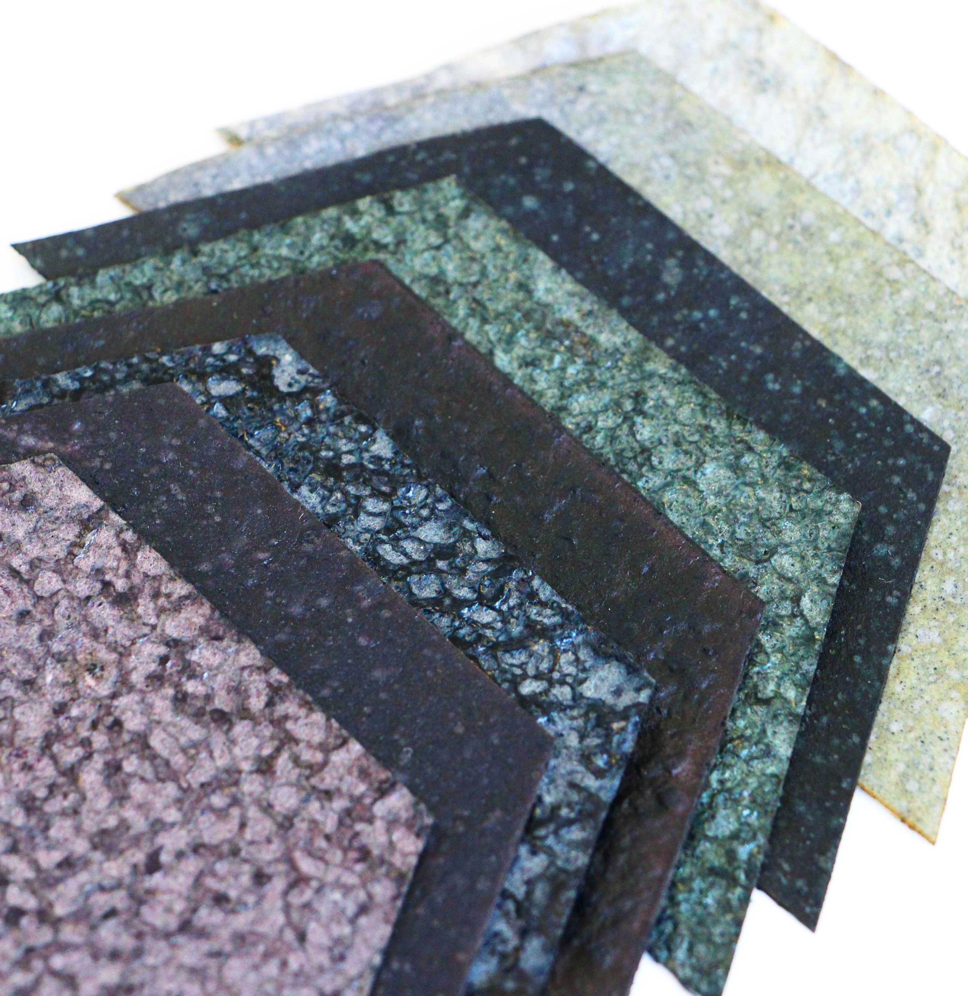 Textured sheets of sustainable biomaterials in various colors, showcasing innovative designs for eco-friendly applications.