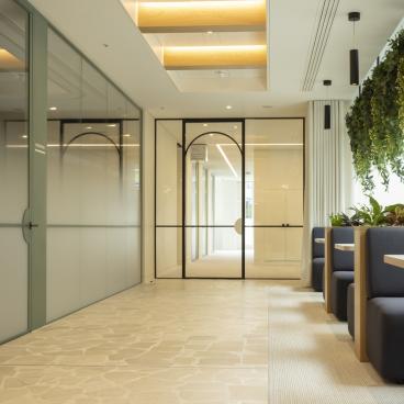 Bespoke door designs and high-end office partitions by Radii for Goodwin Procter.