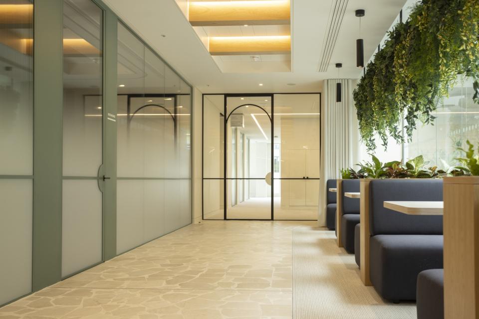 Bespoke door designs and high-end office partitions by Radii for Goodwin Procter.