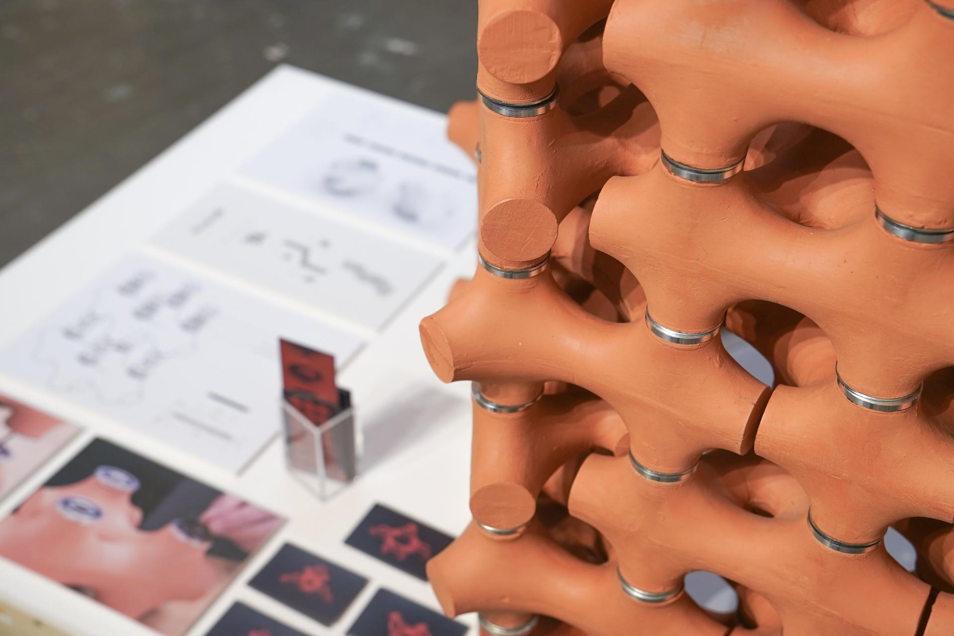 Innovative terracotta structure showcased at TerraCool exhibition, demonstrating natural cooling for urban environments.